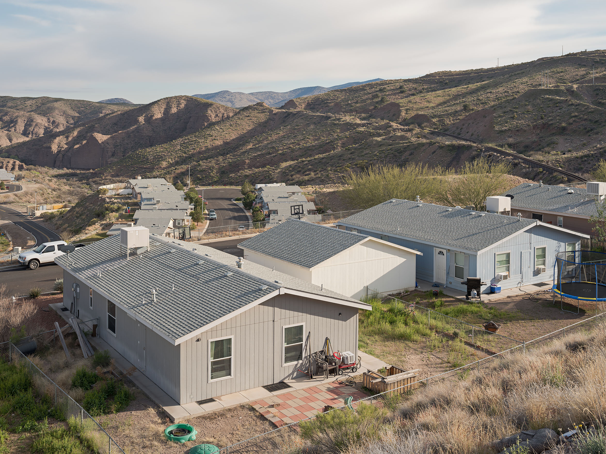  "Copper Verde" Freeport-McMoran Morenci Homes, built with modular construction. A resident suggested this type of fabrication suited a likely scenario where the neighborhood would be moved elsewhere, to allow mining in this location. 