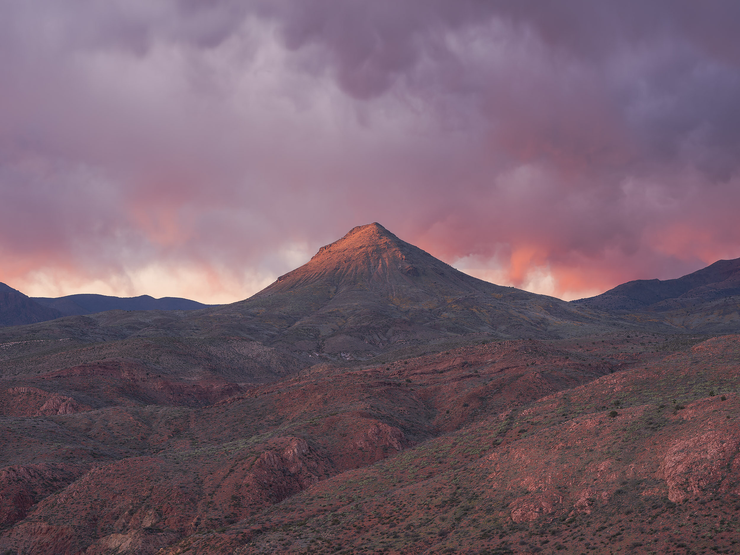 Mulligan Peak, located on National Forest lands, stands tall just east of Morenci Mine.