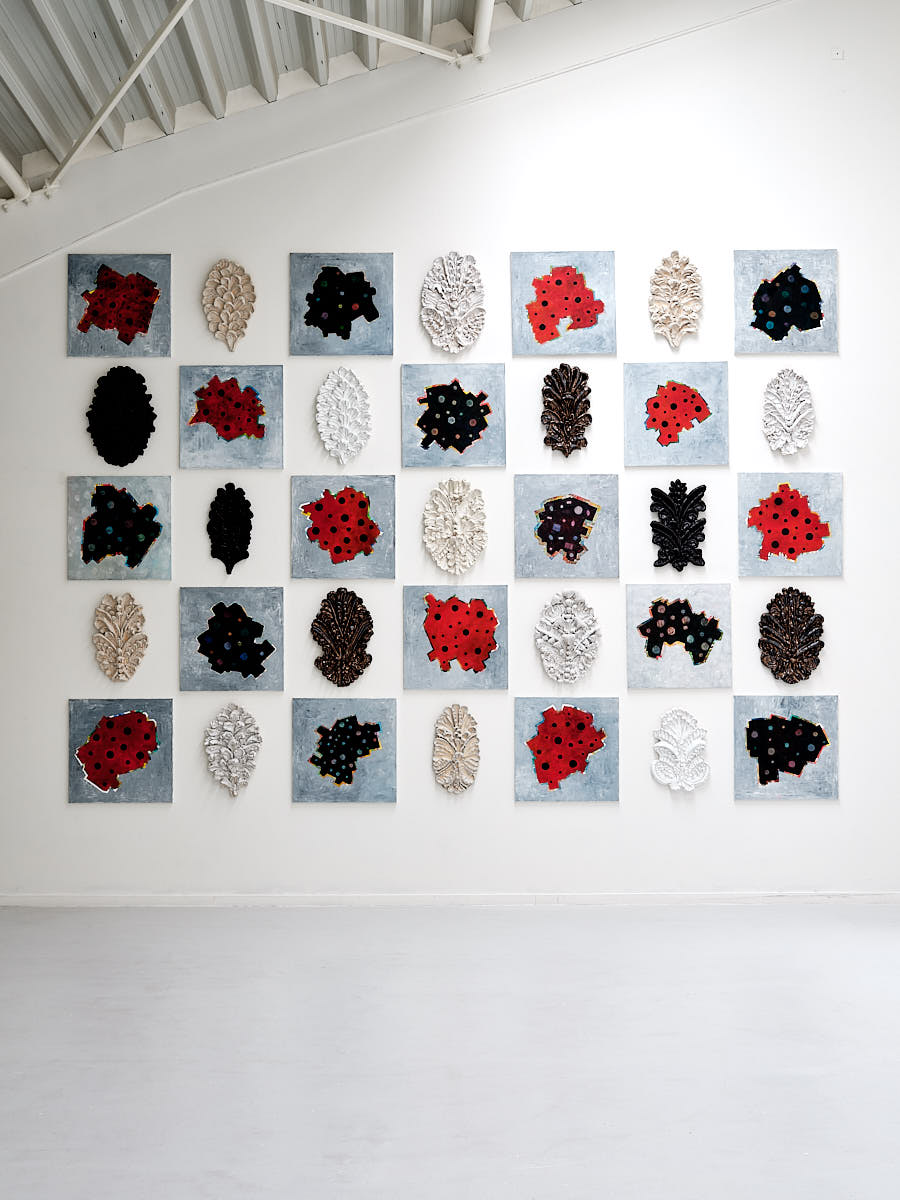 Installation view, ceramic reliefs from Manuel Canu and paintings by Allan Stabell 400x460cm