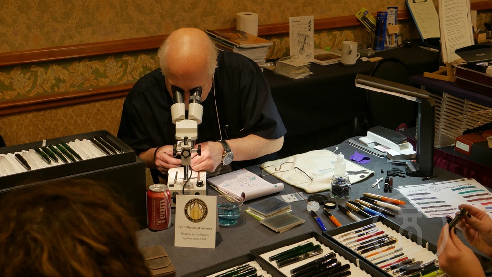Jim Rouse checking the nibs with a microscope no less.
