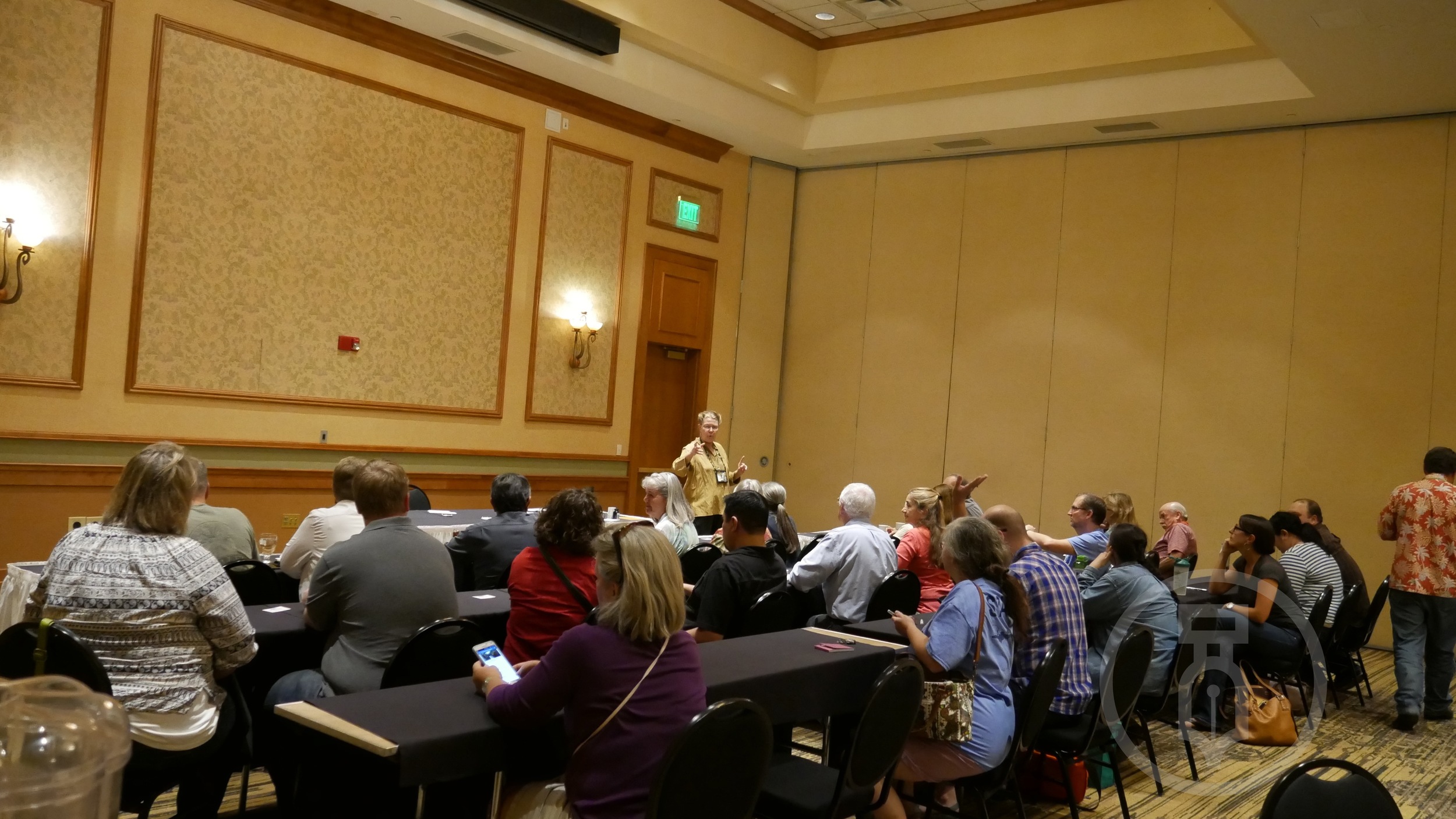Sam Fiorello talking inks to a packed room.