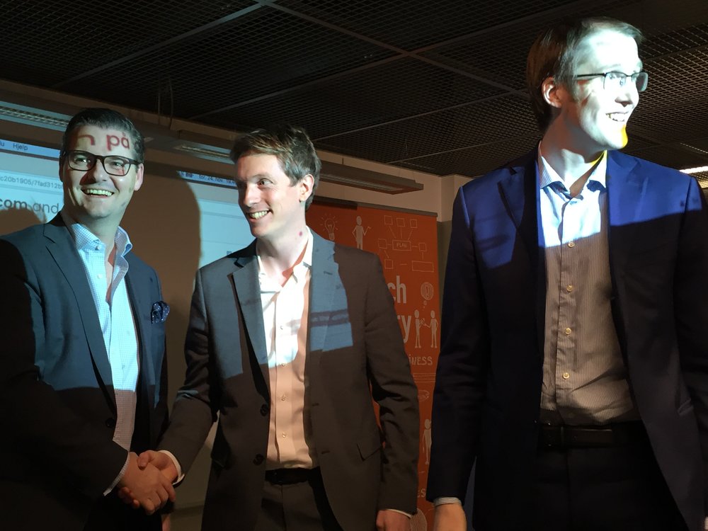 From the left, TheFactory's CEO Ingar S. Bentsen congratulates "The FintechFactory'16 Startup of the Year" award winner Enin AS with the win on November 24.th 2016, here represented by the entrepreneurs Paul I. Huuse and André C. Andersen.