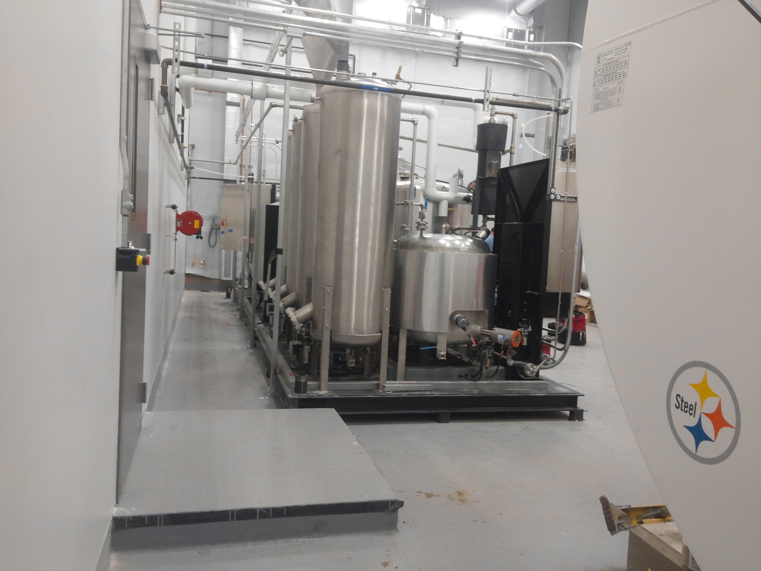 NB processor and methylate tank in new processing room.jpg