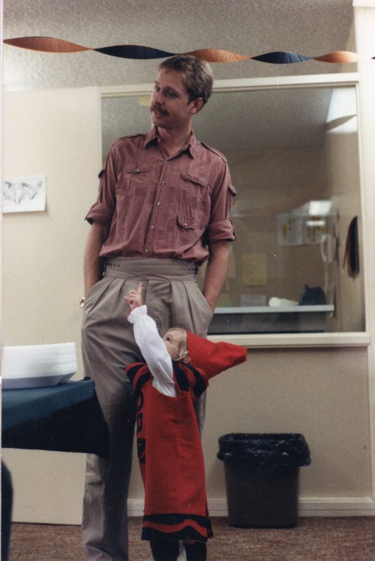 Kelly and a small child, AIS Halloween 1986