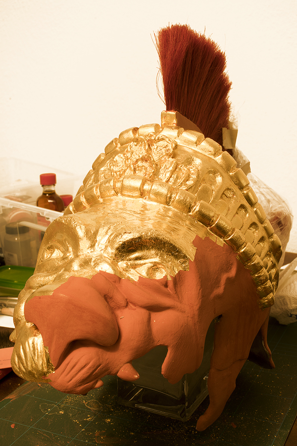 Water gilding Nemeia's helmet