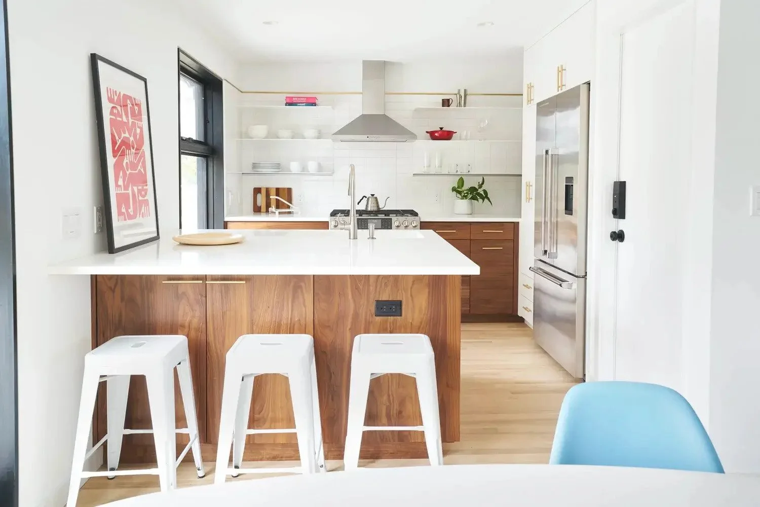Contemporary white kitchen wood cabinets, waterfall island