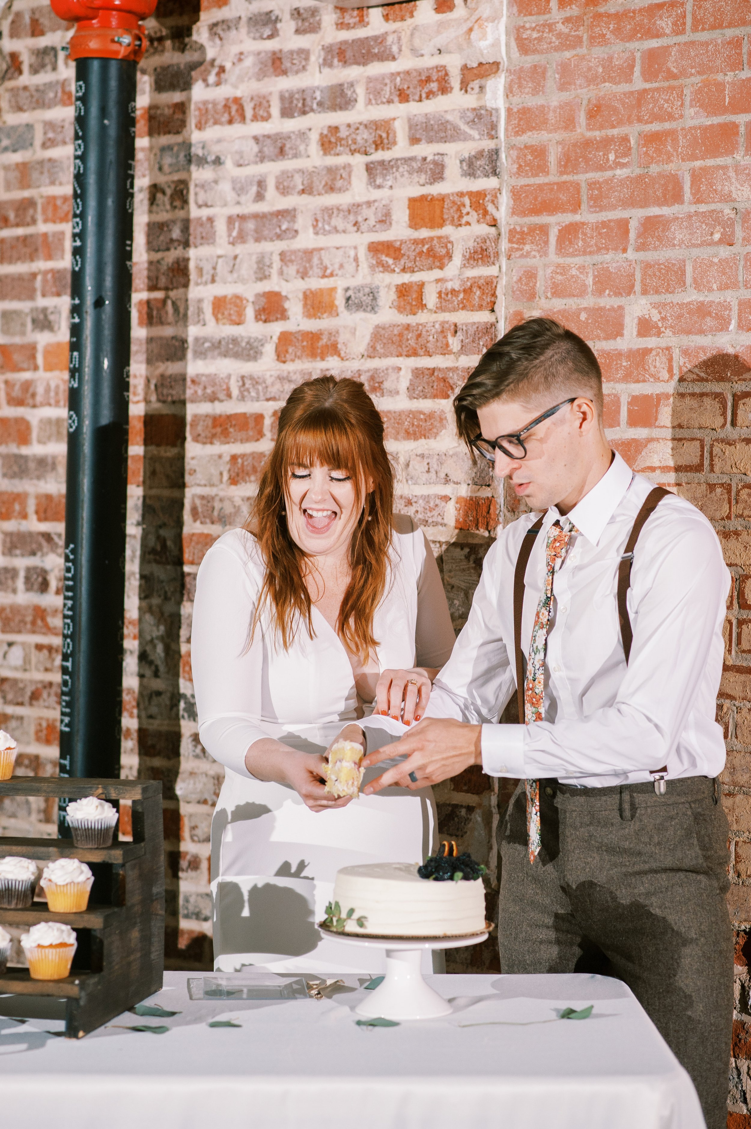 Cake Cutting Ceremony Wedding at The Bottle Factory Monroe NC Fancy This Photography