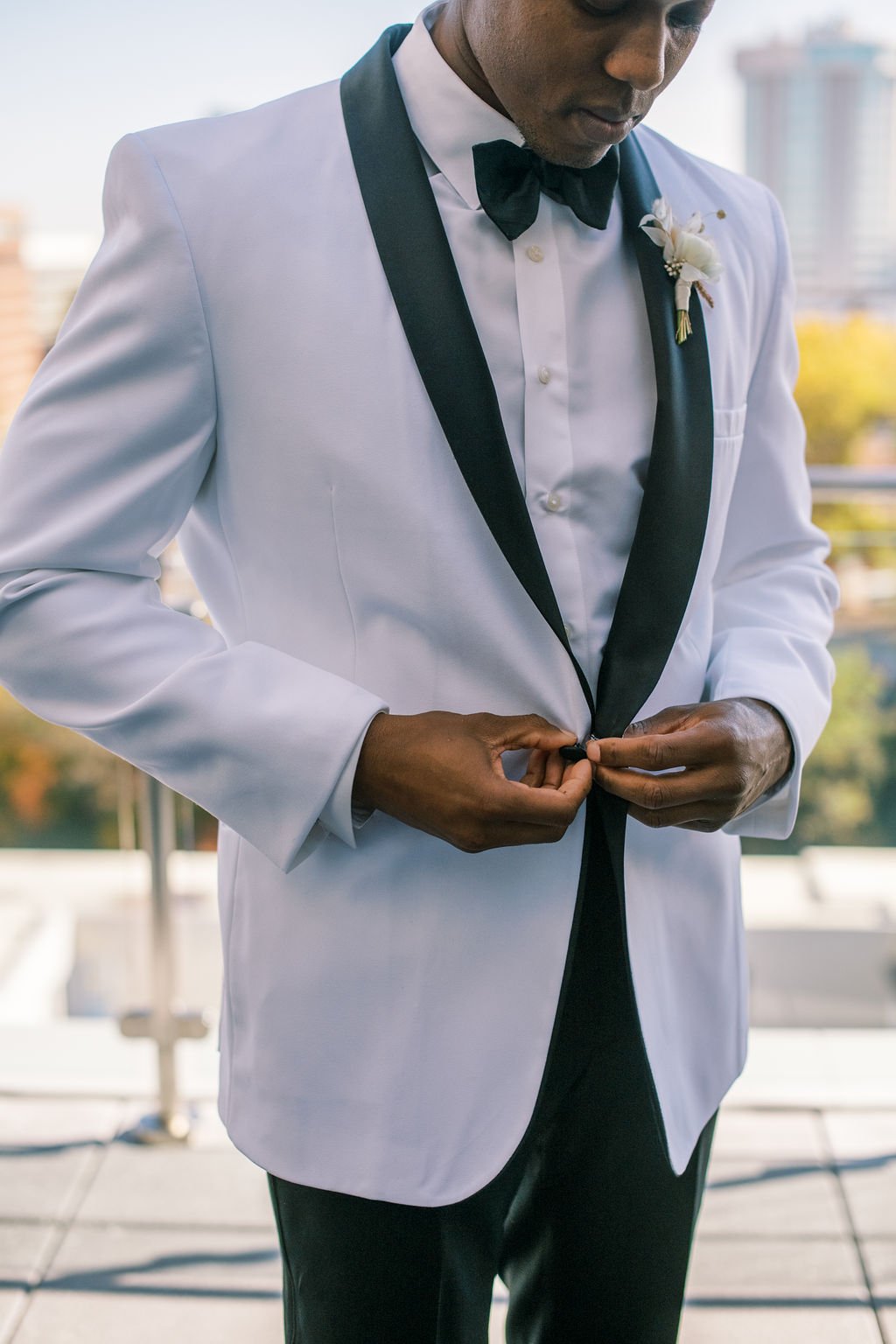 White Tuxedo Bernard's Formalwear The Willard Rooftop Lounge at AC Hotel Raleigh Downtown Fancy This Photography
