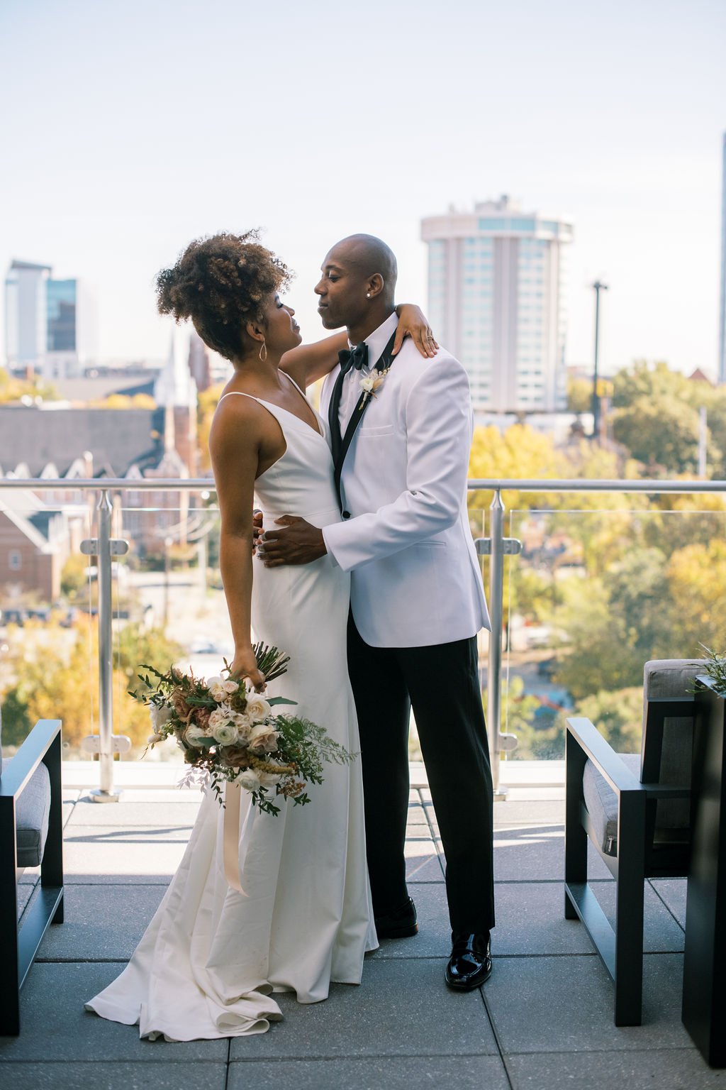 Bride and Groom Romance The Willard Rooftop Lounge at AC Hotel Raleigh Downtown Fancy This Photography