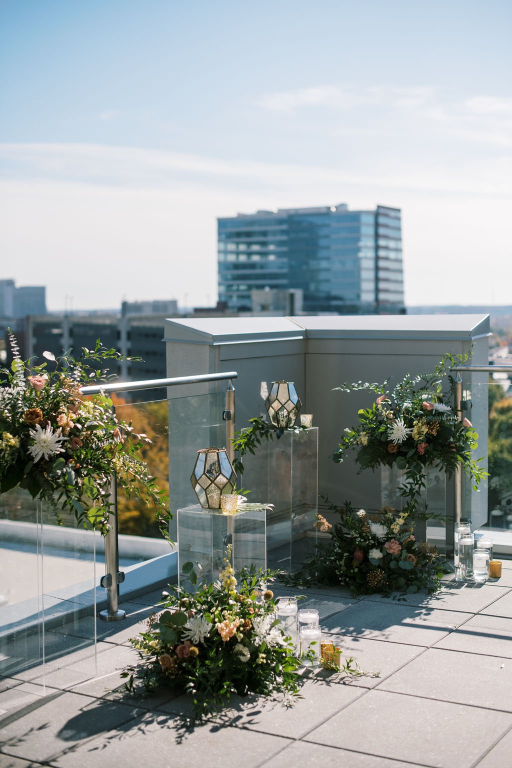 Wedding Ceremony Flowers and decor The Willard Rooftop Lounge at AC Hotel Raleigh Downtown Fancy This Photography