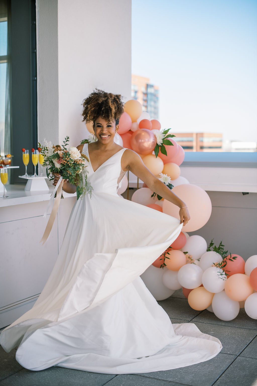 Bride Twirl Dress Balloon Garland The Willard Rooftop Lounge at AC Hotel Raleigh Downtown Fancy This Photography