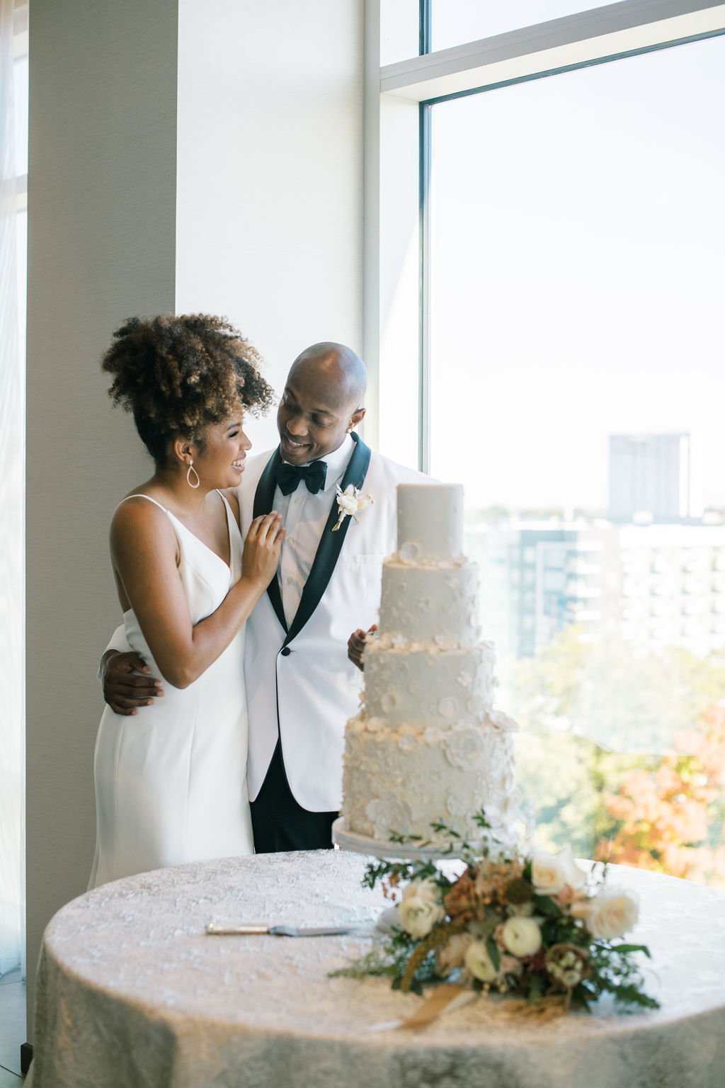Bride Groom Wedding Cake The Willard Rooftop Lounge at AC Hotel Raleigh Downtown Fancy This Photography