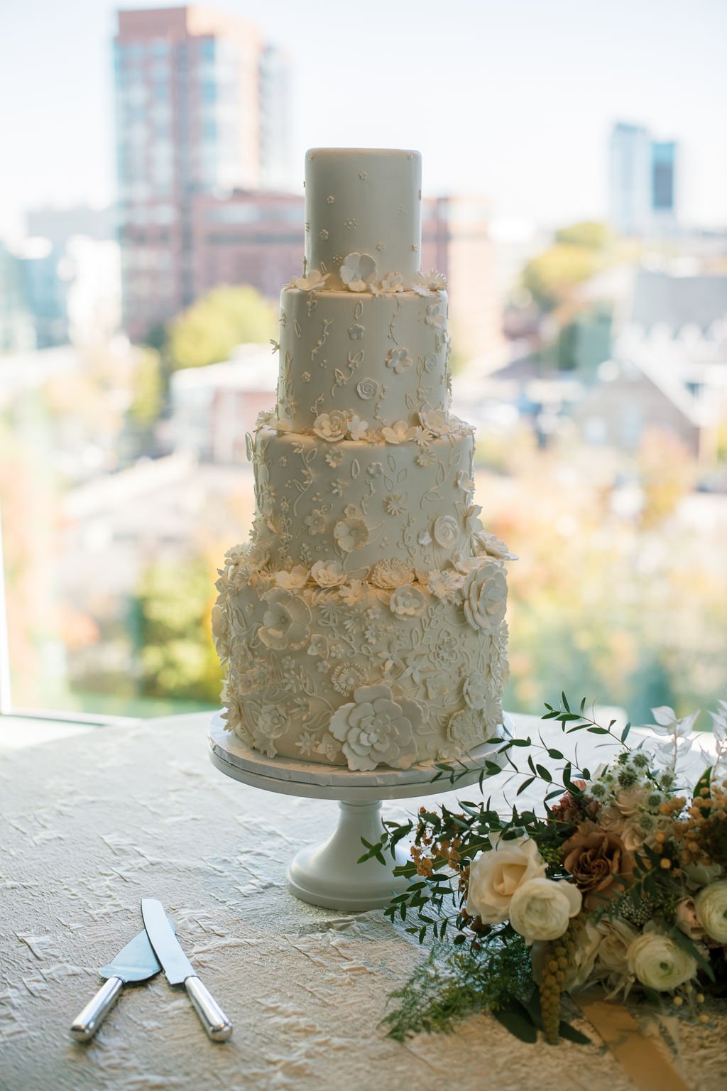 White Flower Wedding Cake The Willard Rooftop Lounge at AC Hotel Raleigh Downtown Fancy This Photography
