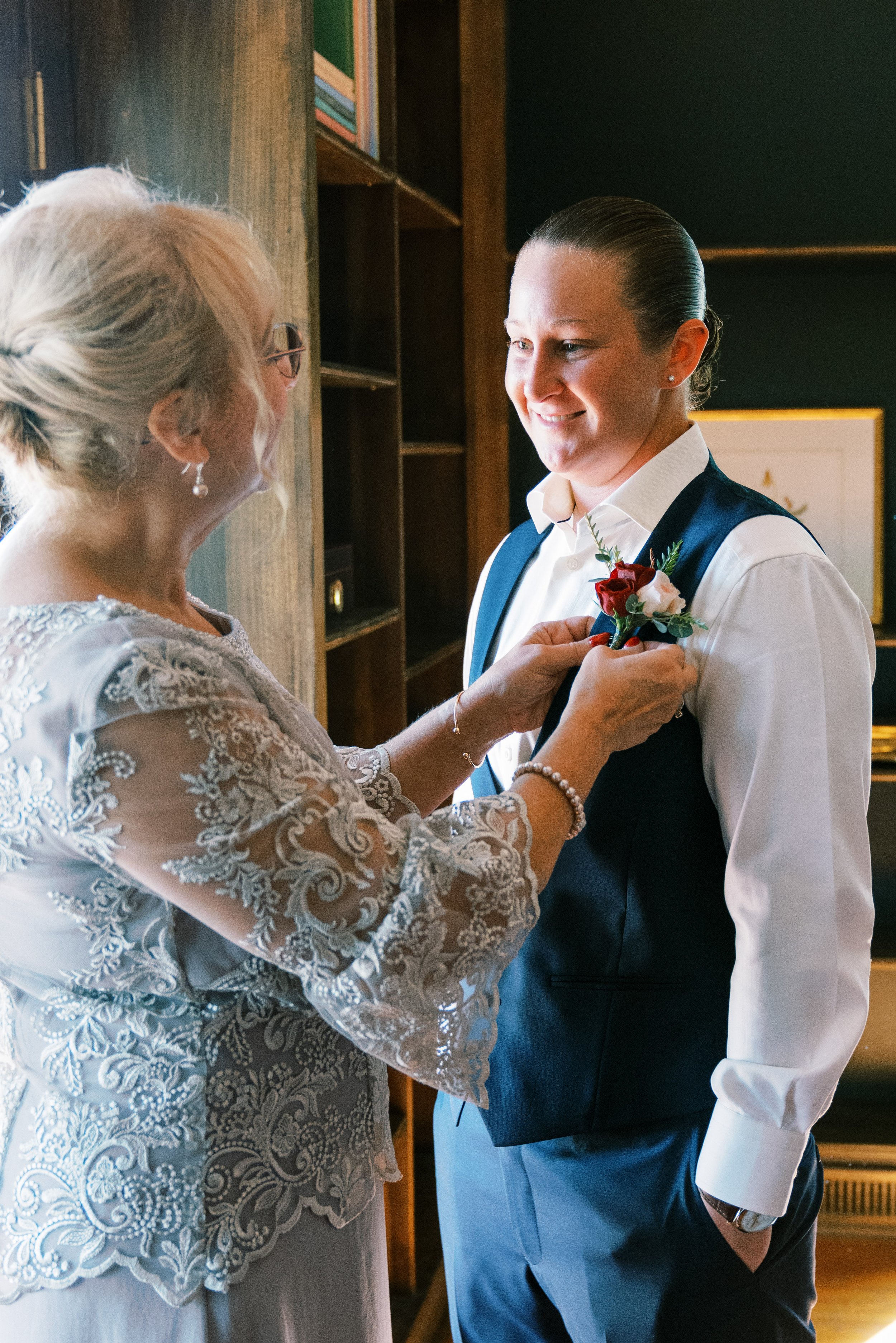 Bride in Suit and Mother Getting Ready Walnut Hill NC Wedding Venue Fancy This Photography