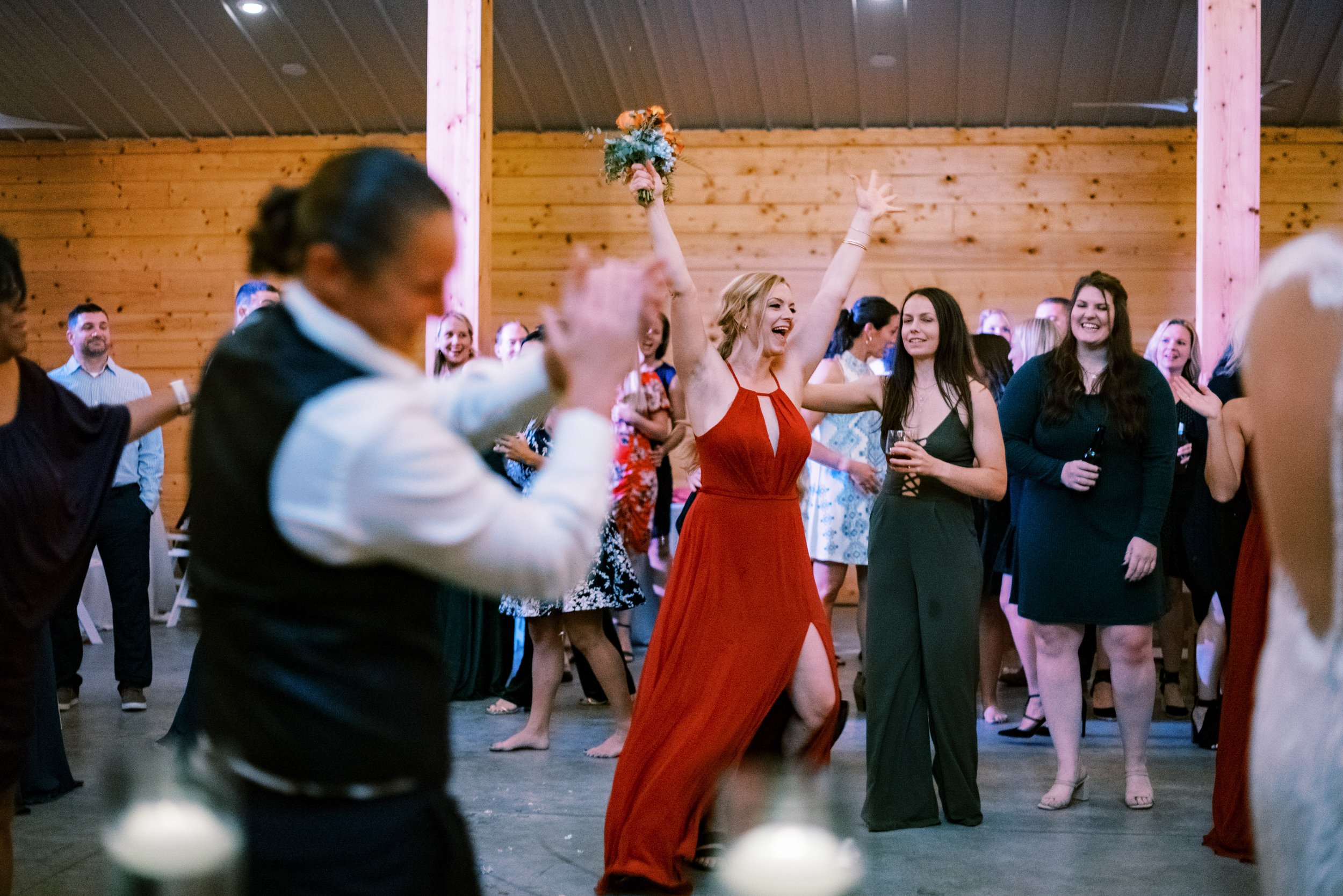 Bride and Bouquet Toss Walnut Hill NC Wedding Venue Fancy This Photography