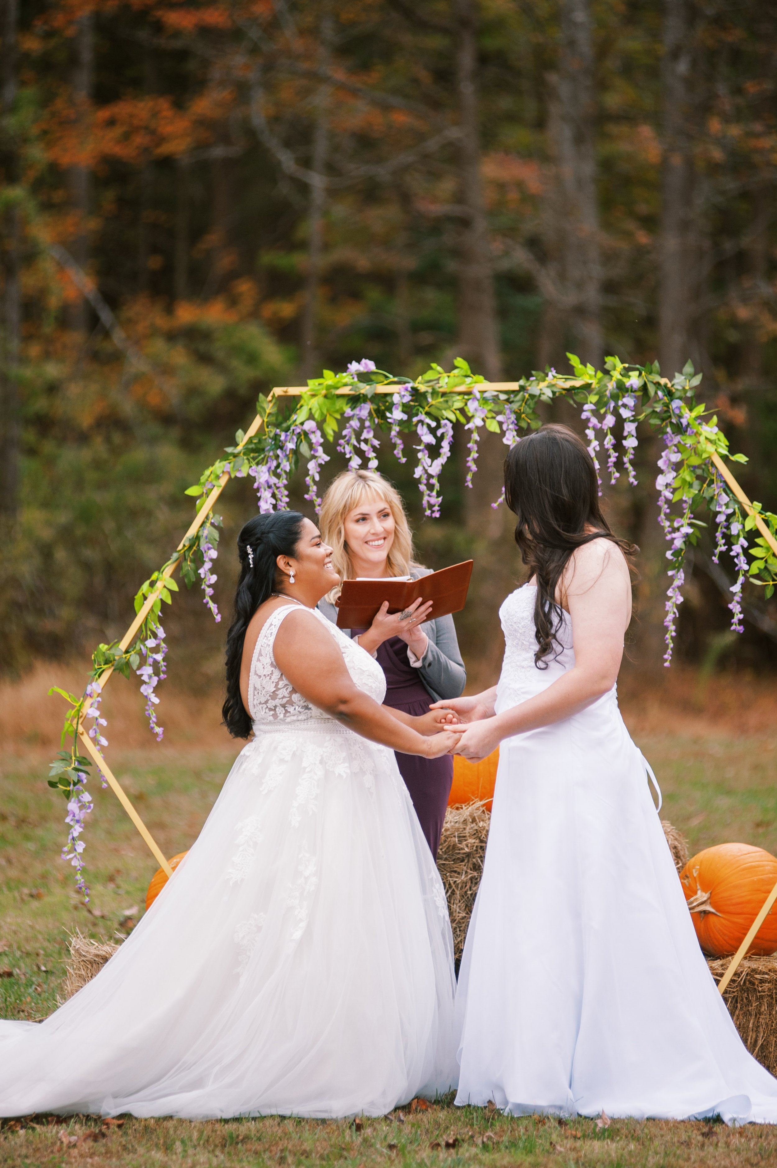 Brides and Rev Dupree at Beautiful Mebane NC Wedding in Family's Backyard Fancy This Photography