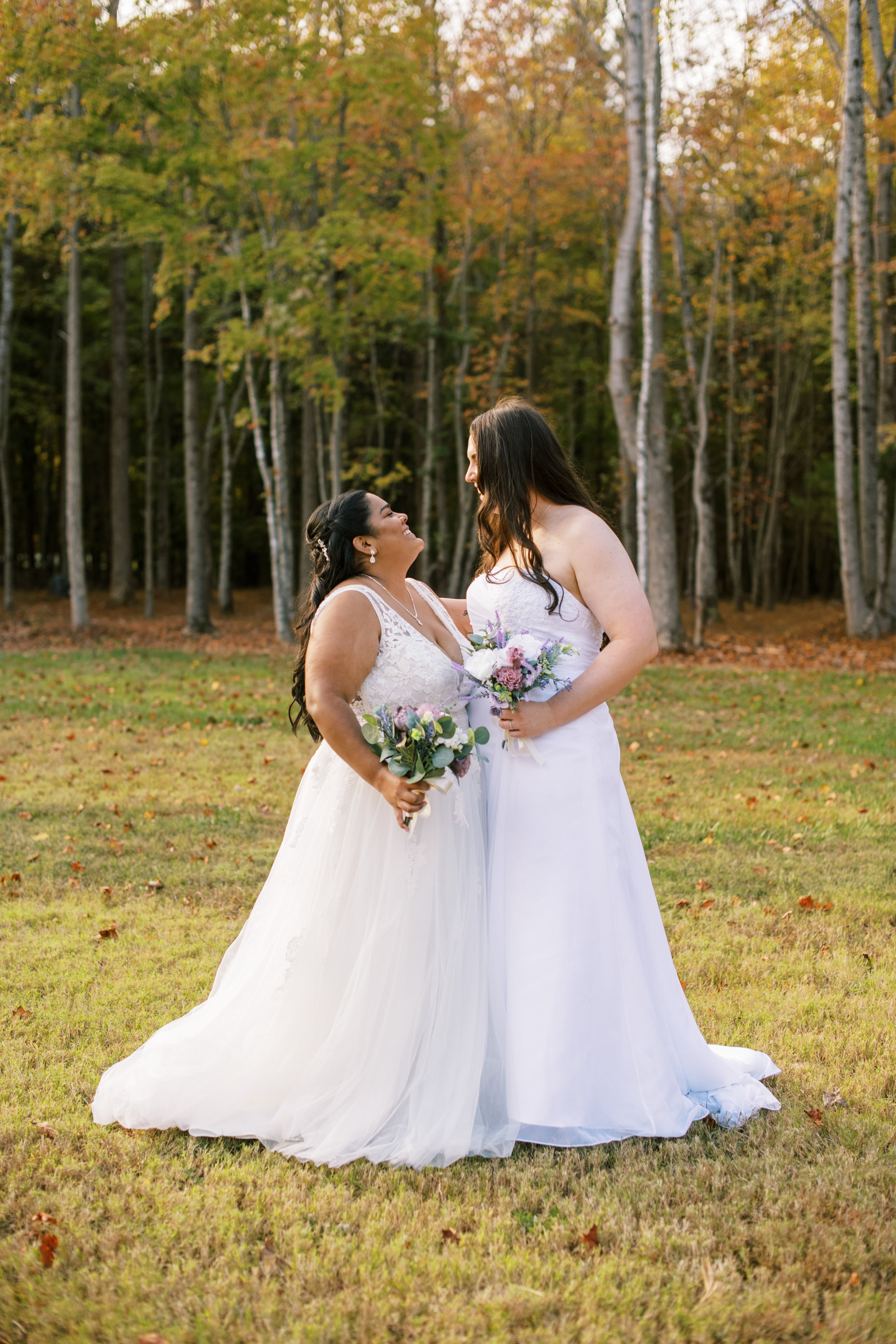 Brides Smile At Each Other Beautiful Mebane NC Wedding in Family's Backyard Fancy This Photography