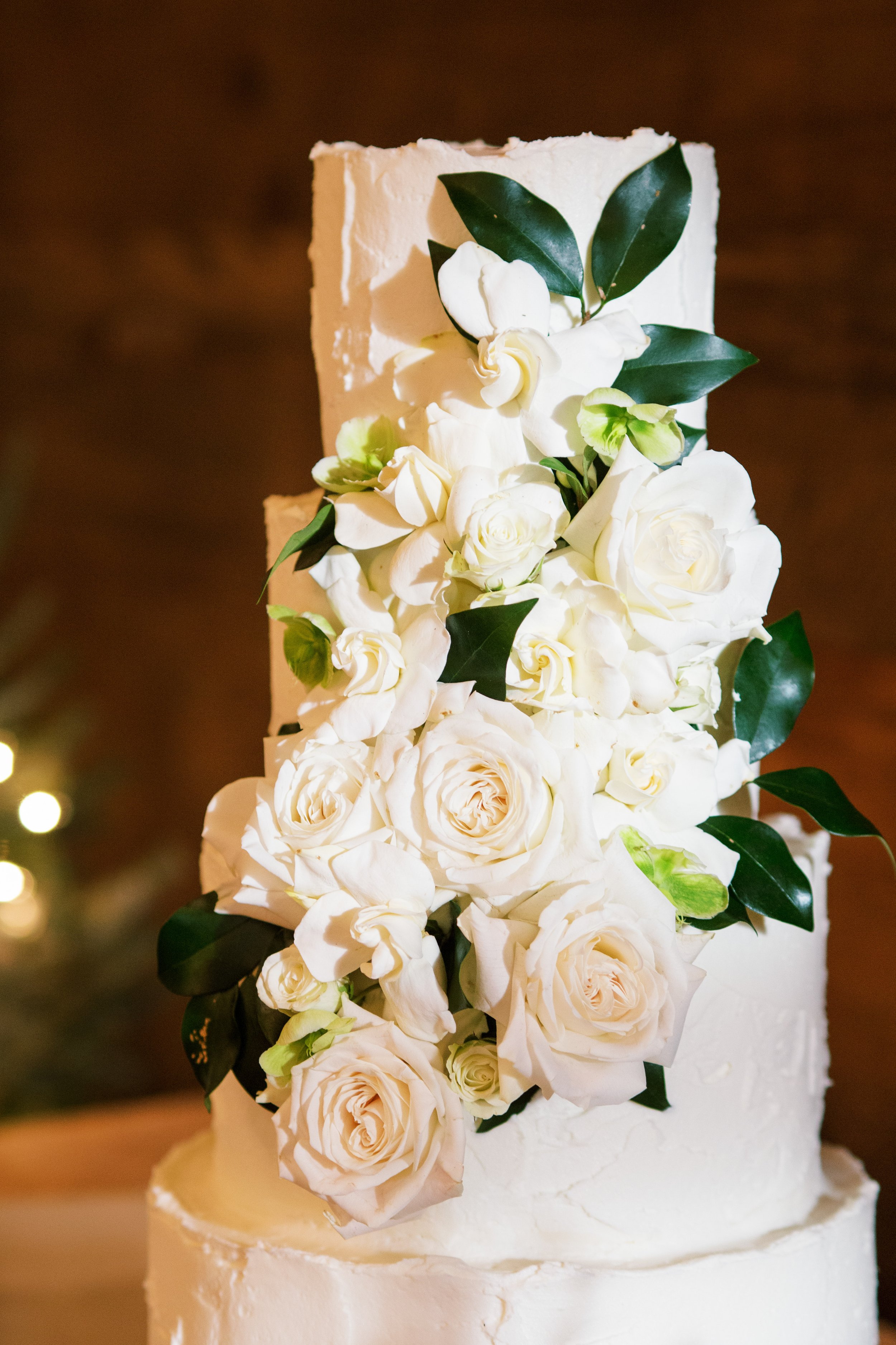White Cake Covered in Flowers Wedding at The Cloth Mill at Eno River&nbsp;Fancy This Photography