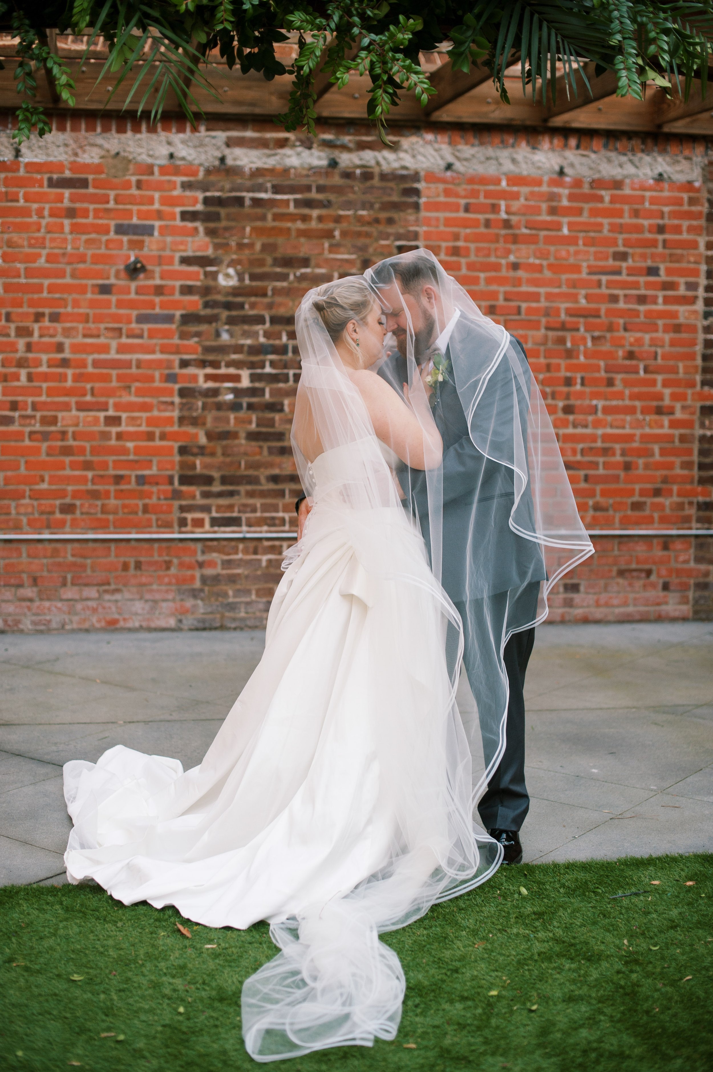 Bride and Groom Under Veil Wedding at The Cloth Mill at Eno River&nbsp;Fancy This Photography