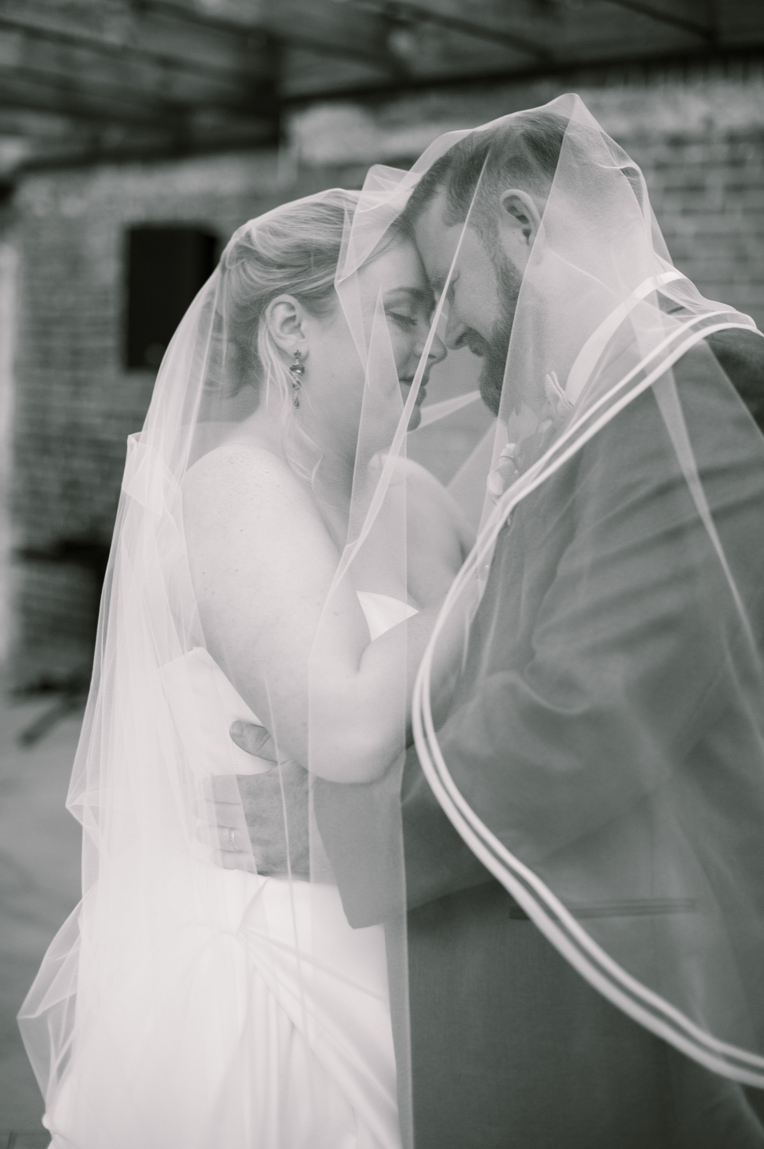 Black and White Bride and Groom Covered in Veil Wedding at The Cloth Mill at Eno River&nbsp;Fancy This Photography