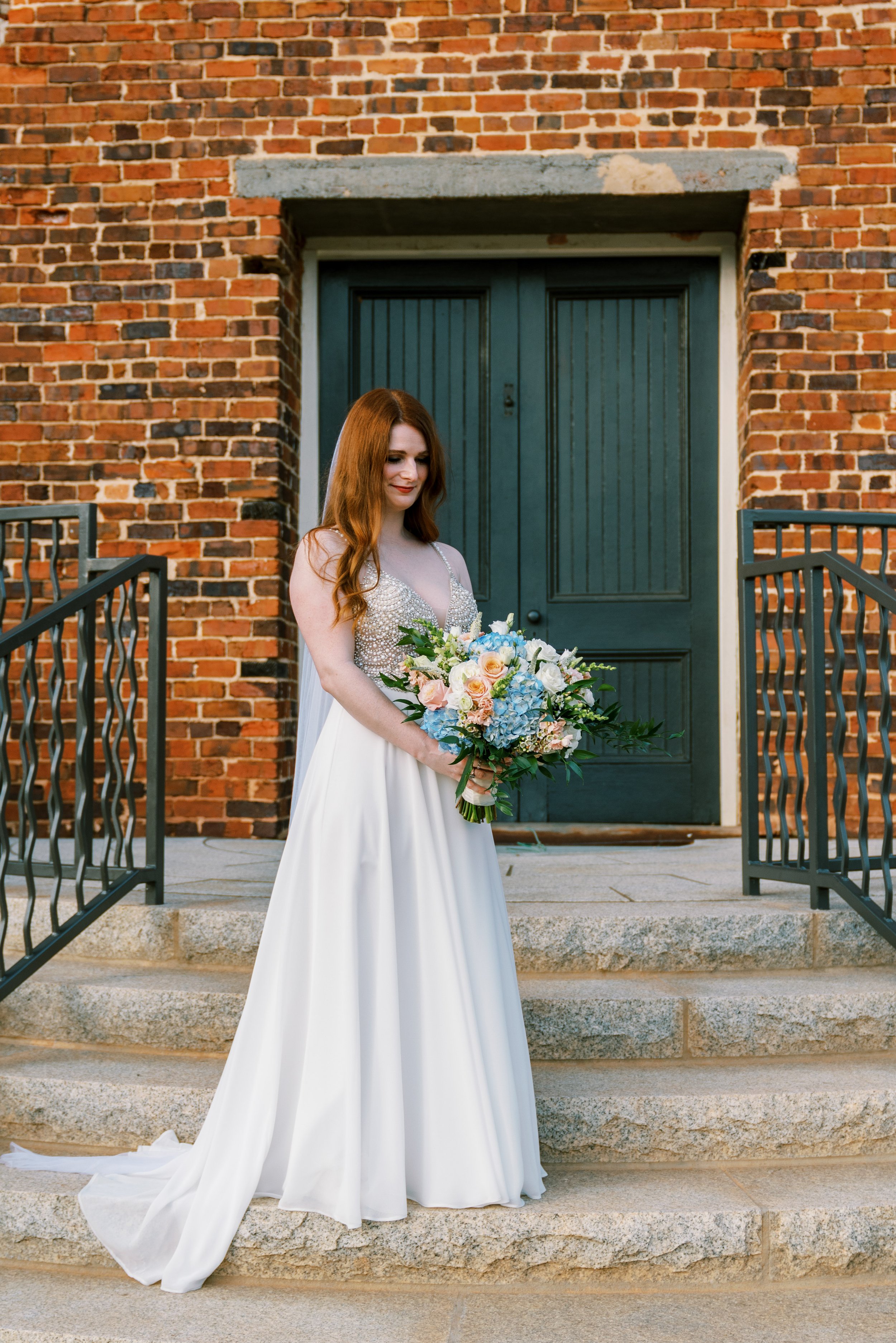 Bride in Doorway Historic Downtown Salisbury North Carolina Wedding at The Meroney Theater  Fancy This Photography
