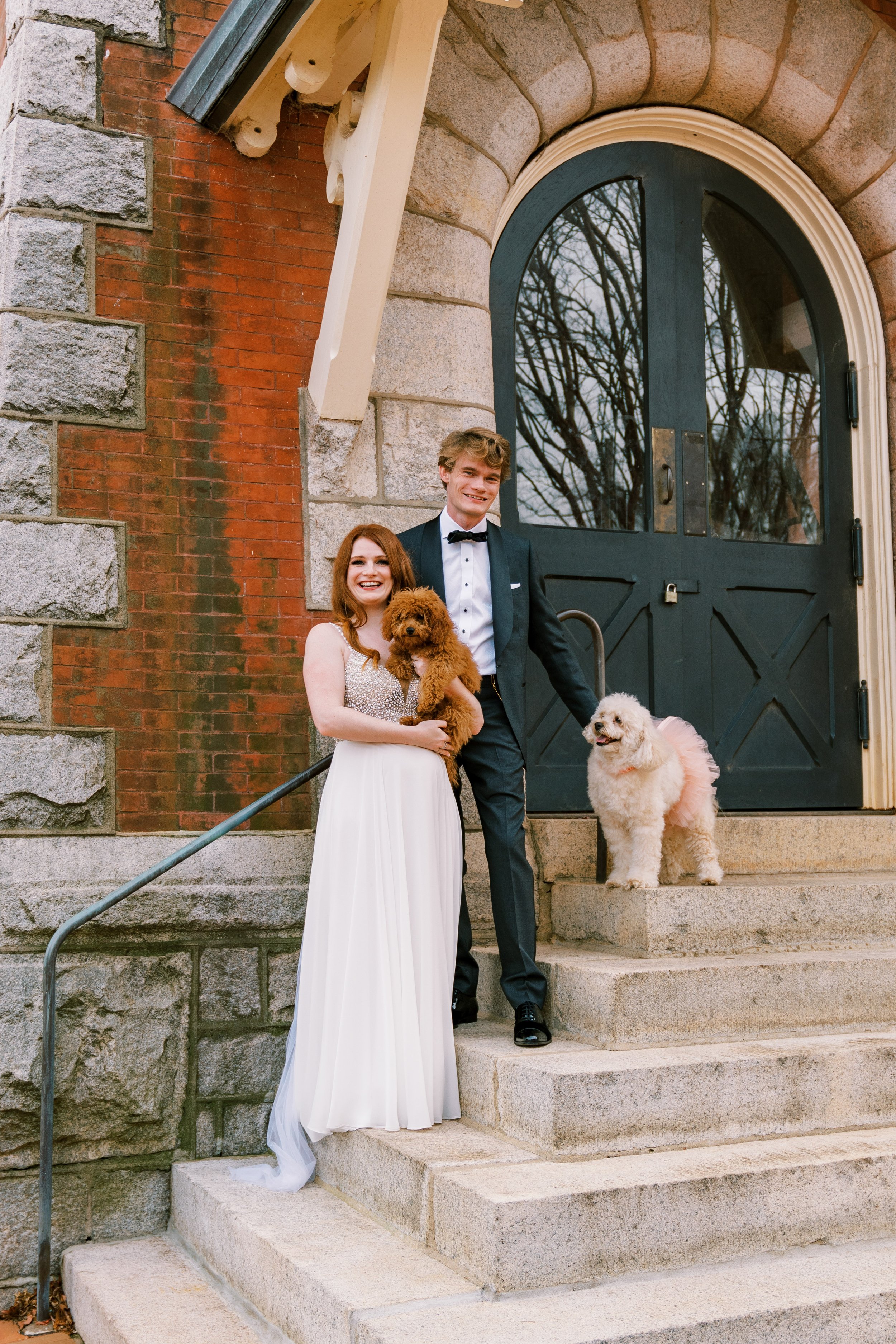 Bride and Groom Stairs Pink Dogs Salisbury North Carolina Wedding at The Meroney Theater  Fancy This Photography
