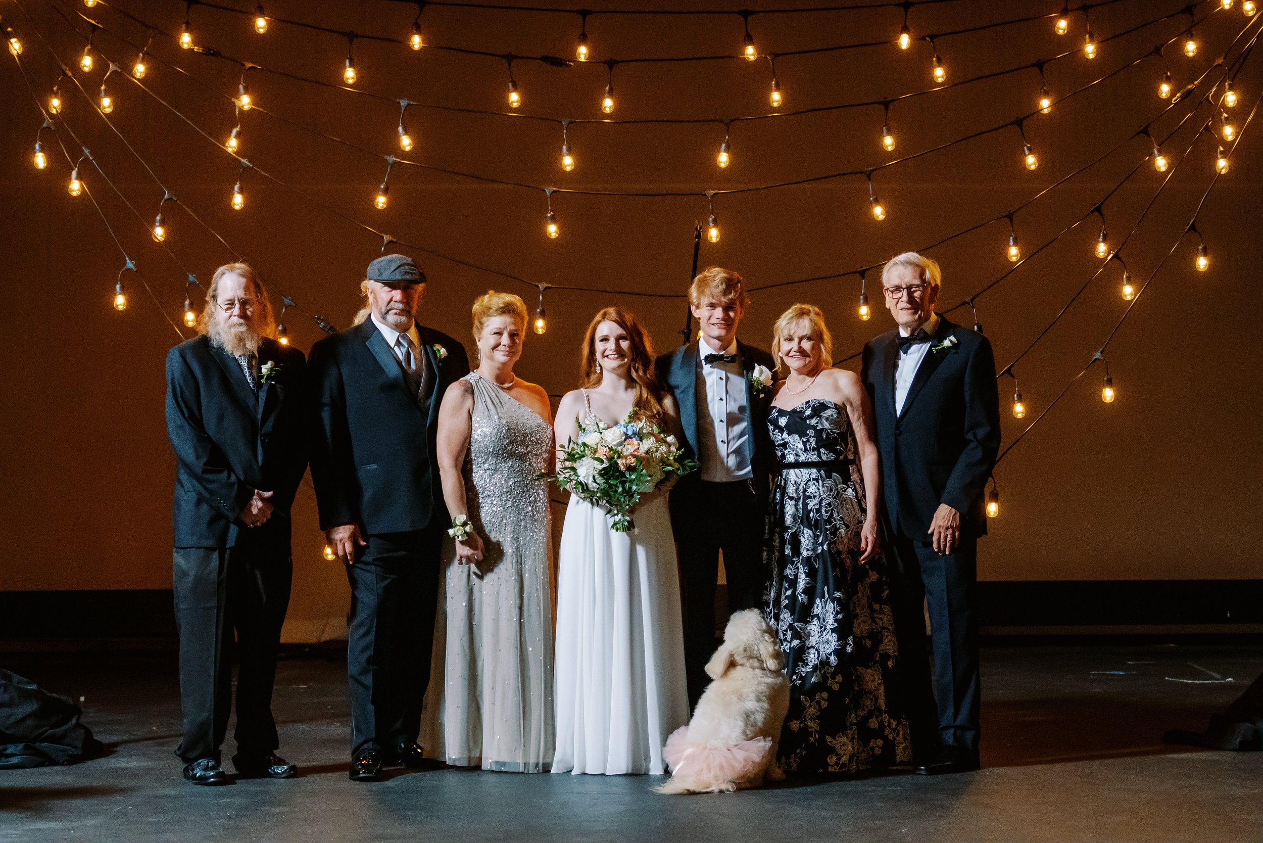 Family Photo on Stage Salisbury North Carolina Wedding at The Meroney Theater  Fancy This Photography