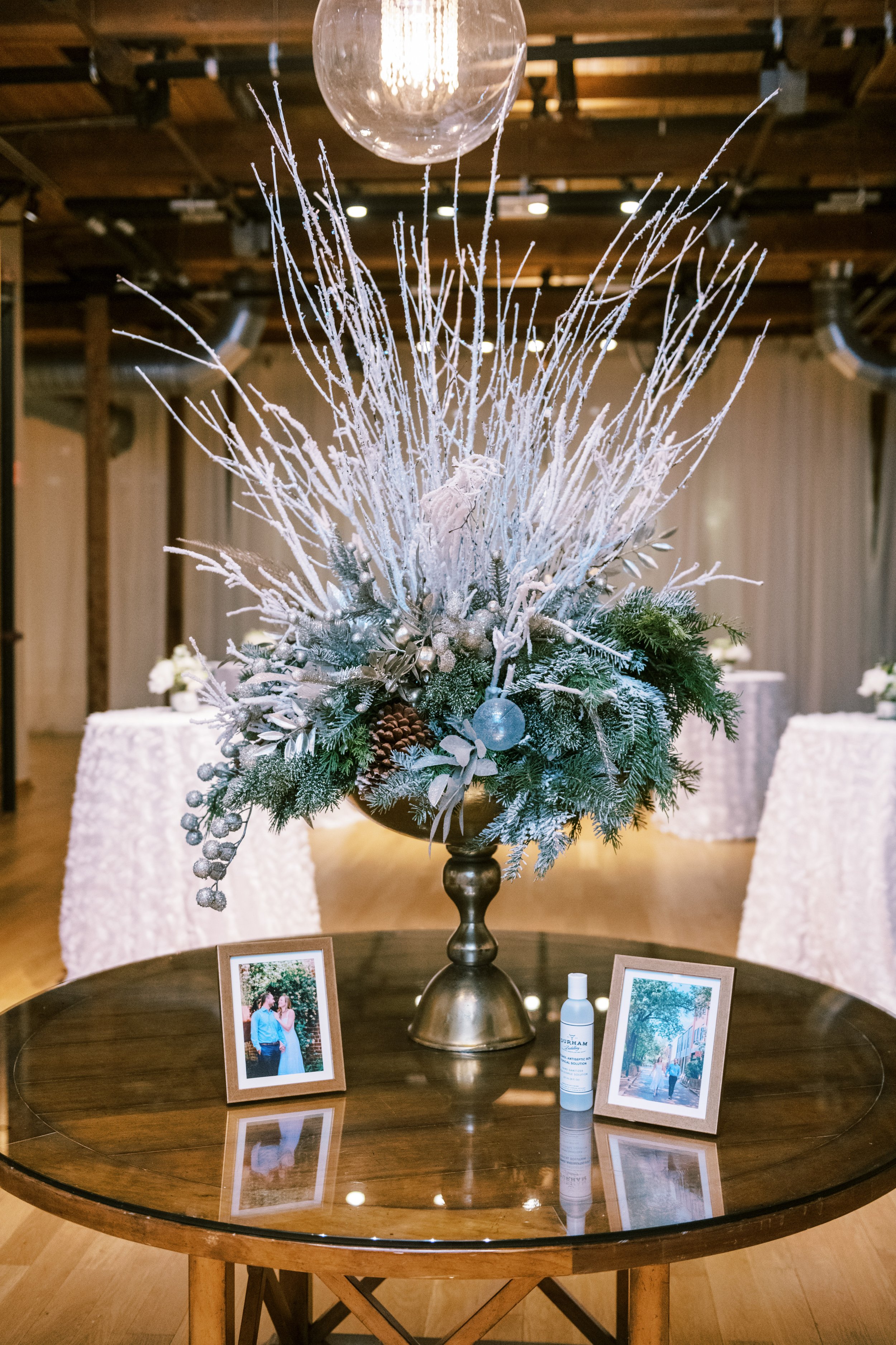 Entrance Table Winter Wedding Flowers Wedding at The Cotton Room Durham NC Fancy This Photography