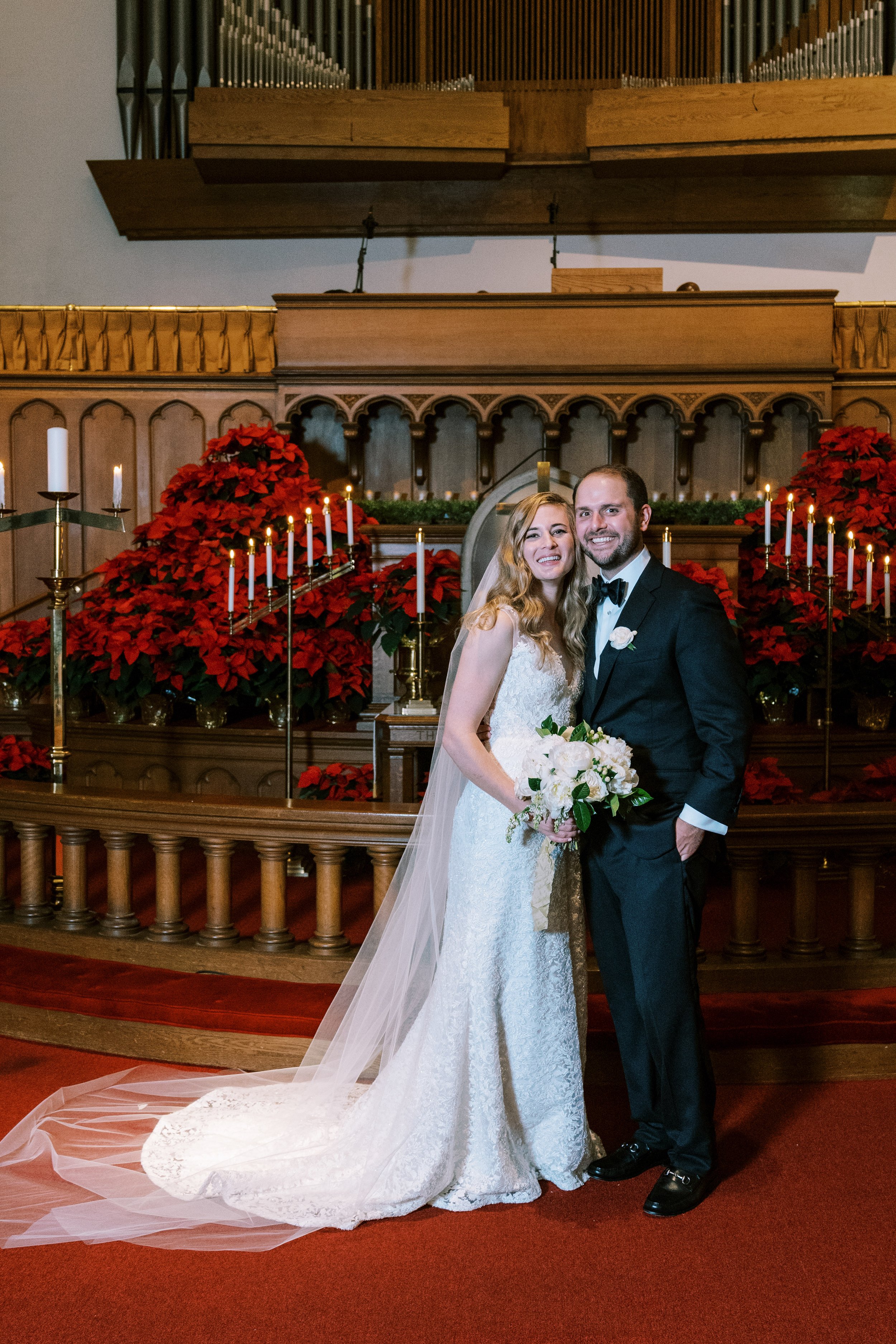 Bride and Groom Duke Memorial United Methodist Church Christmas Wedding at The Cotton Room Durham NC Fancy This Photography