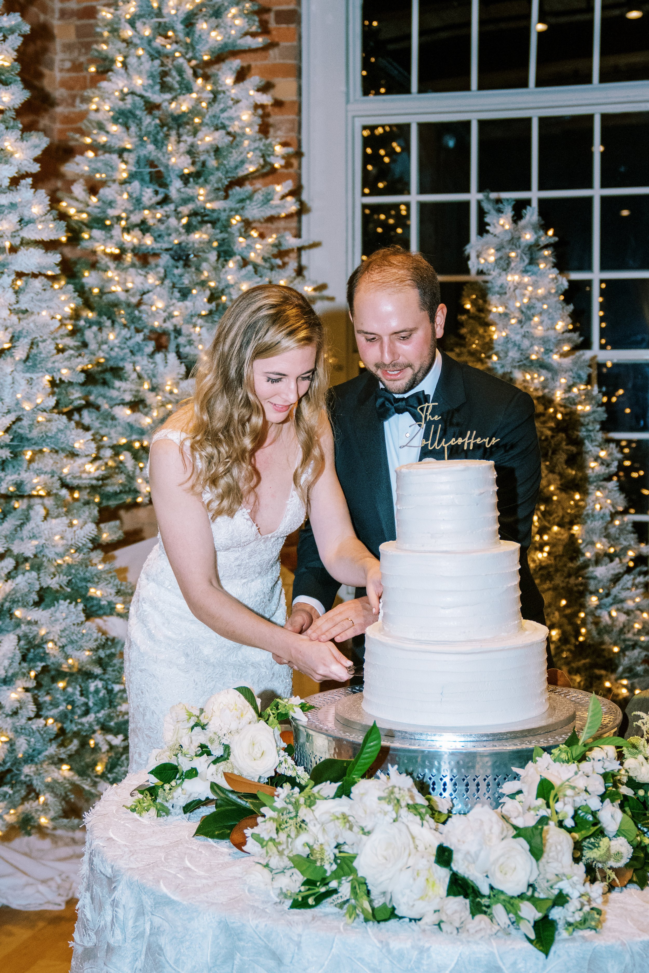 Bride and Groom Cut Cake Wedding at The Cotton Room Durham NC Fancy This Photography