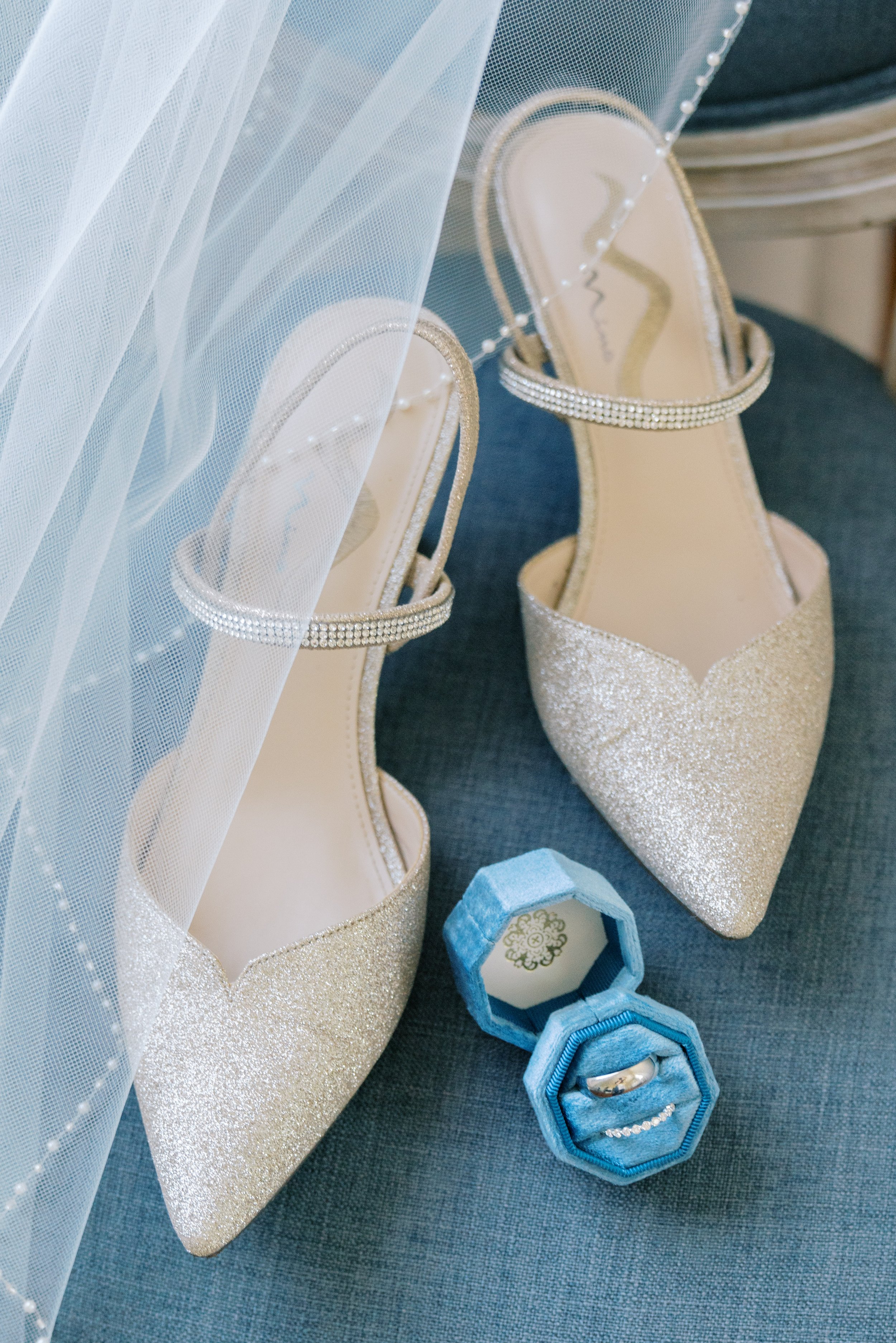 Bridal Shoes and Blue Ring Box Raleigh Event Space Walnut Hill Wedding Venue Fancy This Photography