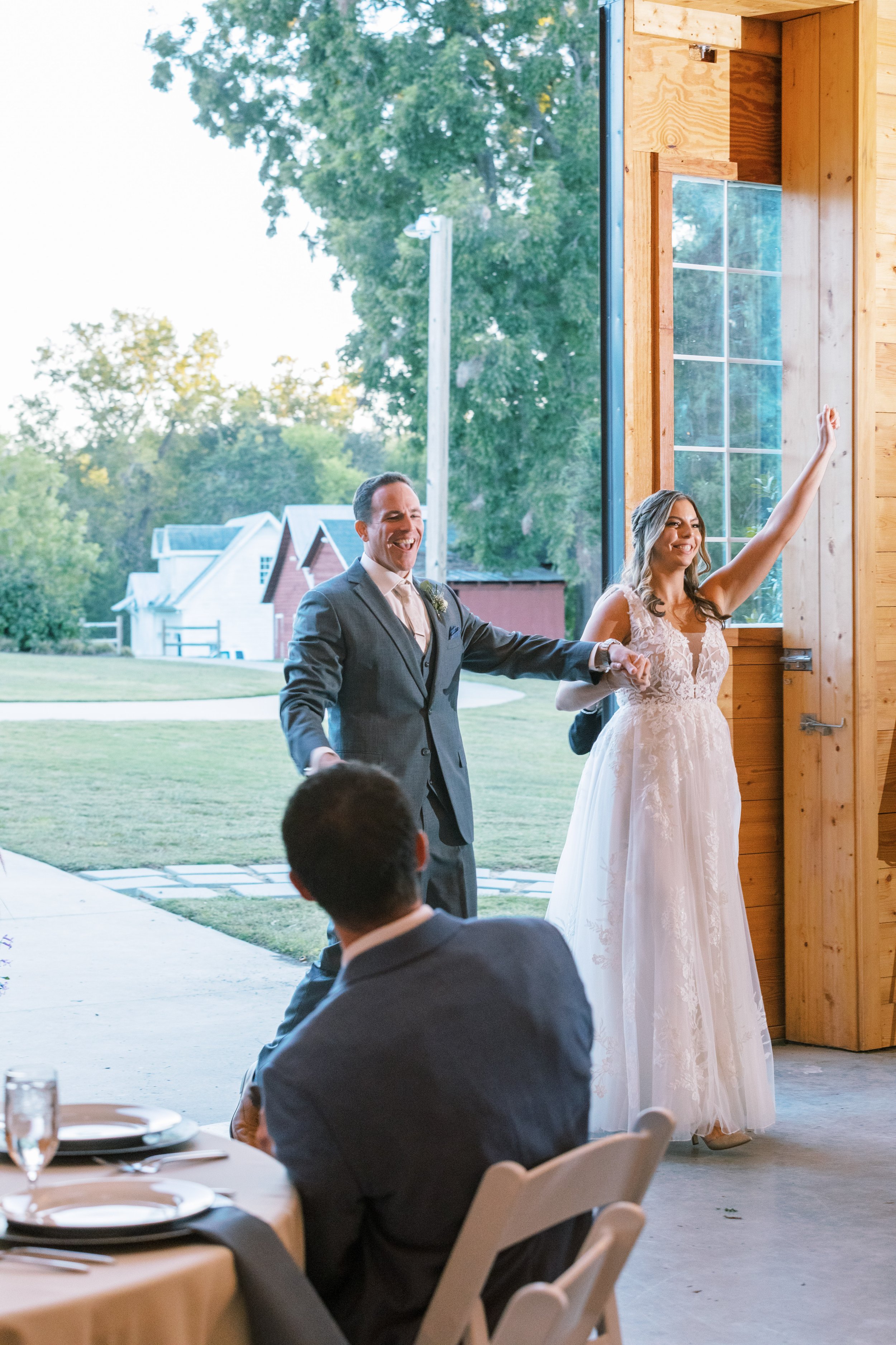 Bride and Groom Enter Reception Walnut Hill Wedding Venue Fancy This Photography