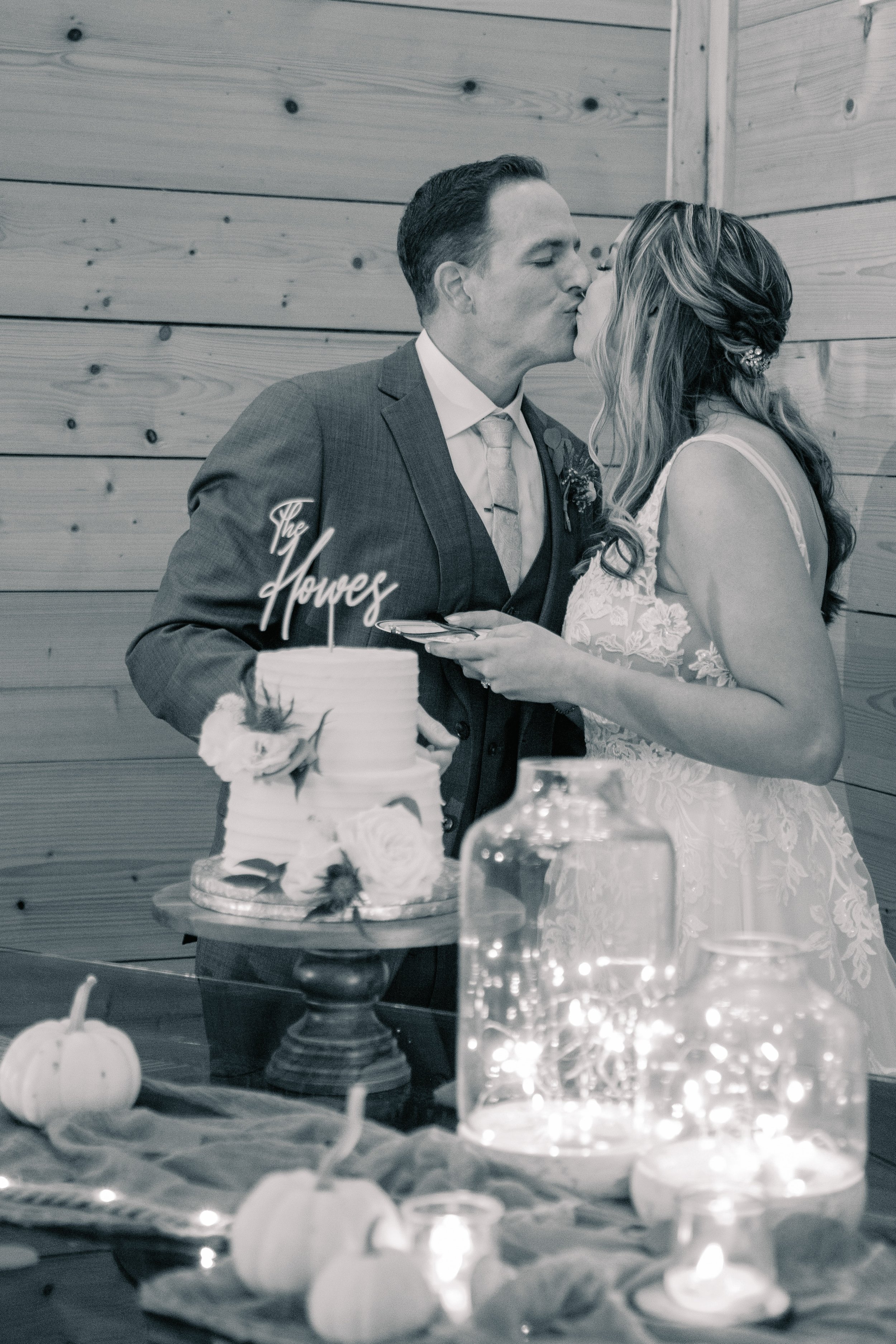 Cake Kiss Bride and Groom Walnut Hill Wedding Venue Fancy This Photography