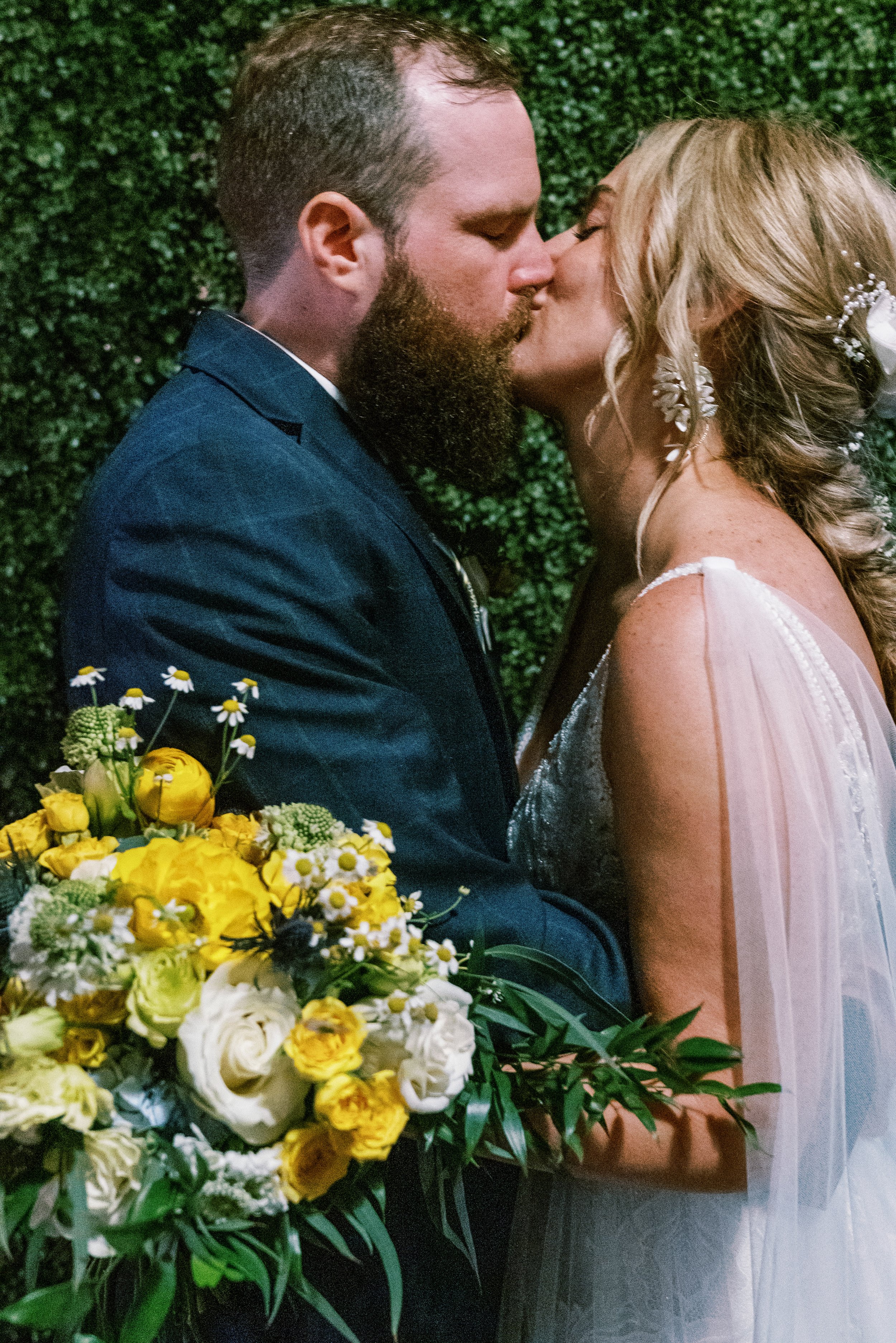Newlywed Kiss Yellow Bouquet Bloom Works Whitaker &amp; Atlantic Wedding in Raleigh, NC Fancy This Photography