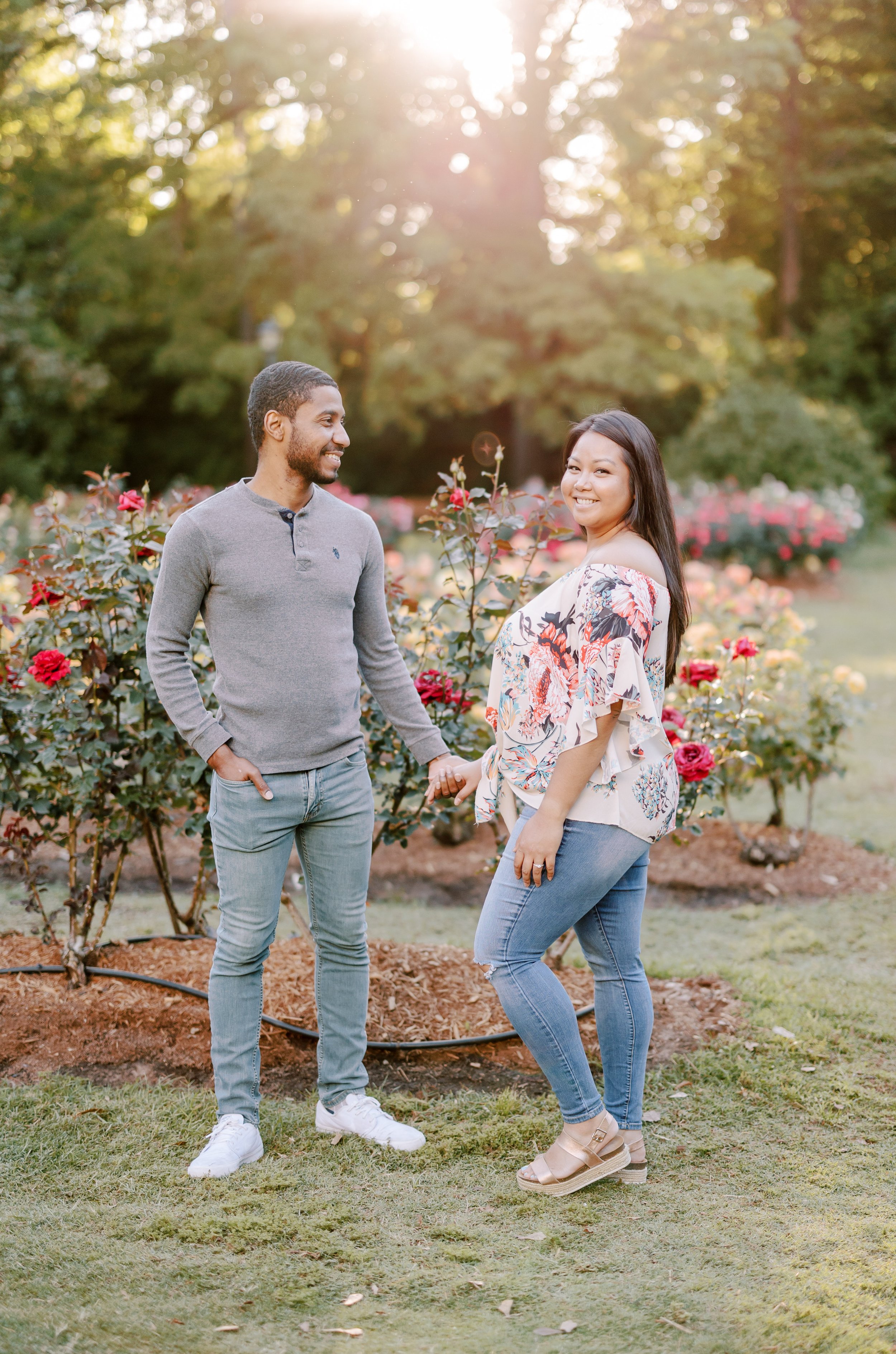 Rose Garden Romance Couple Engagement Photos in The Raleigh Rose Garden Fancy This Photography