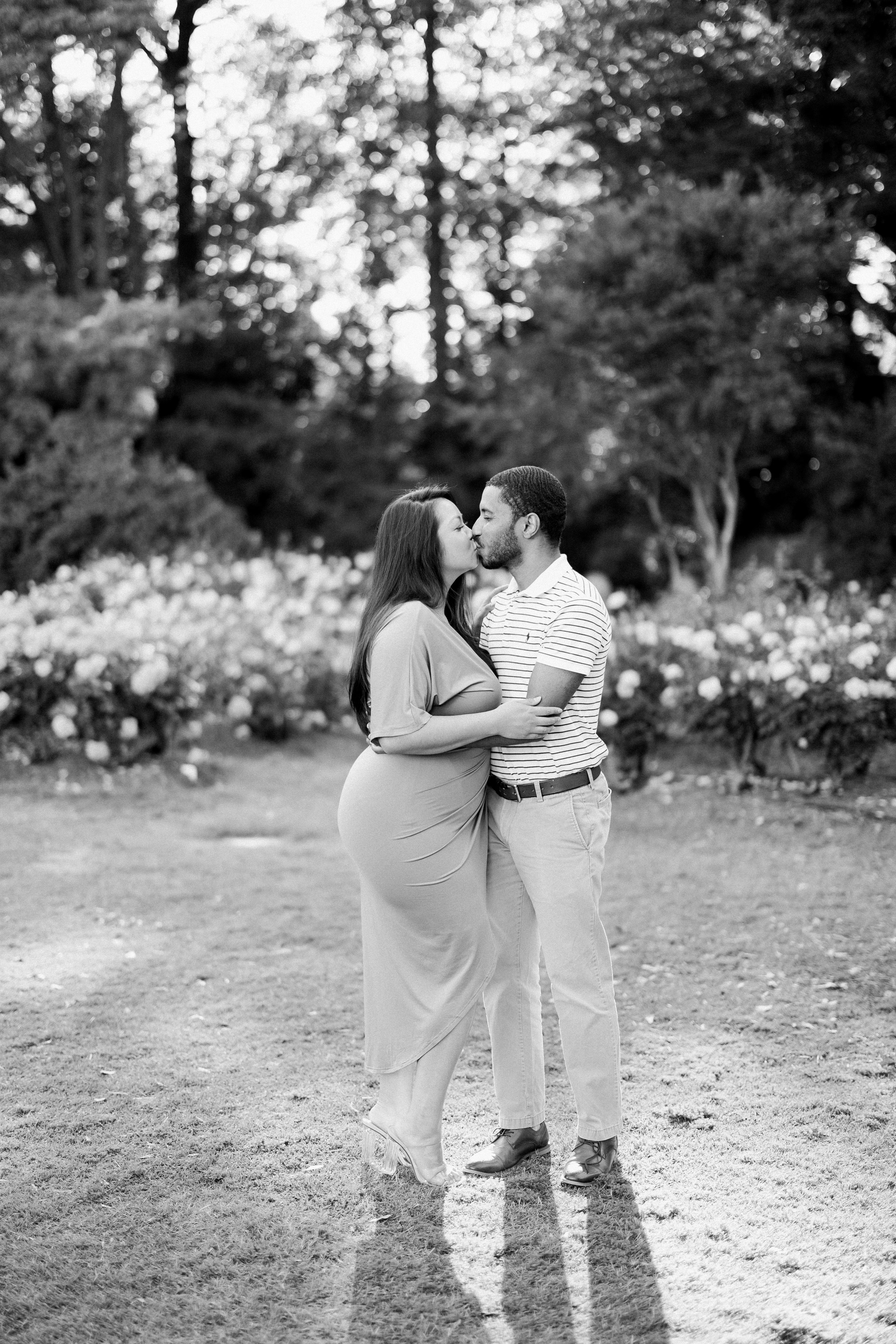 Sexy Black and White Image Engagement Photos in The Raleigh Rose Garden Fancy This Photography