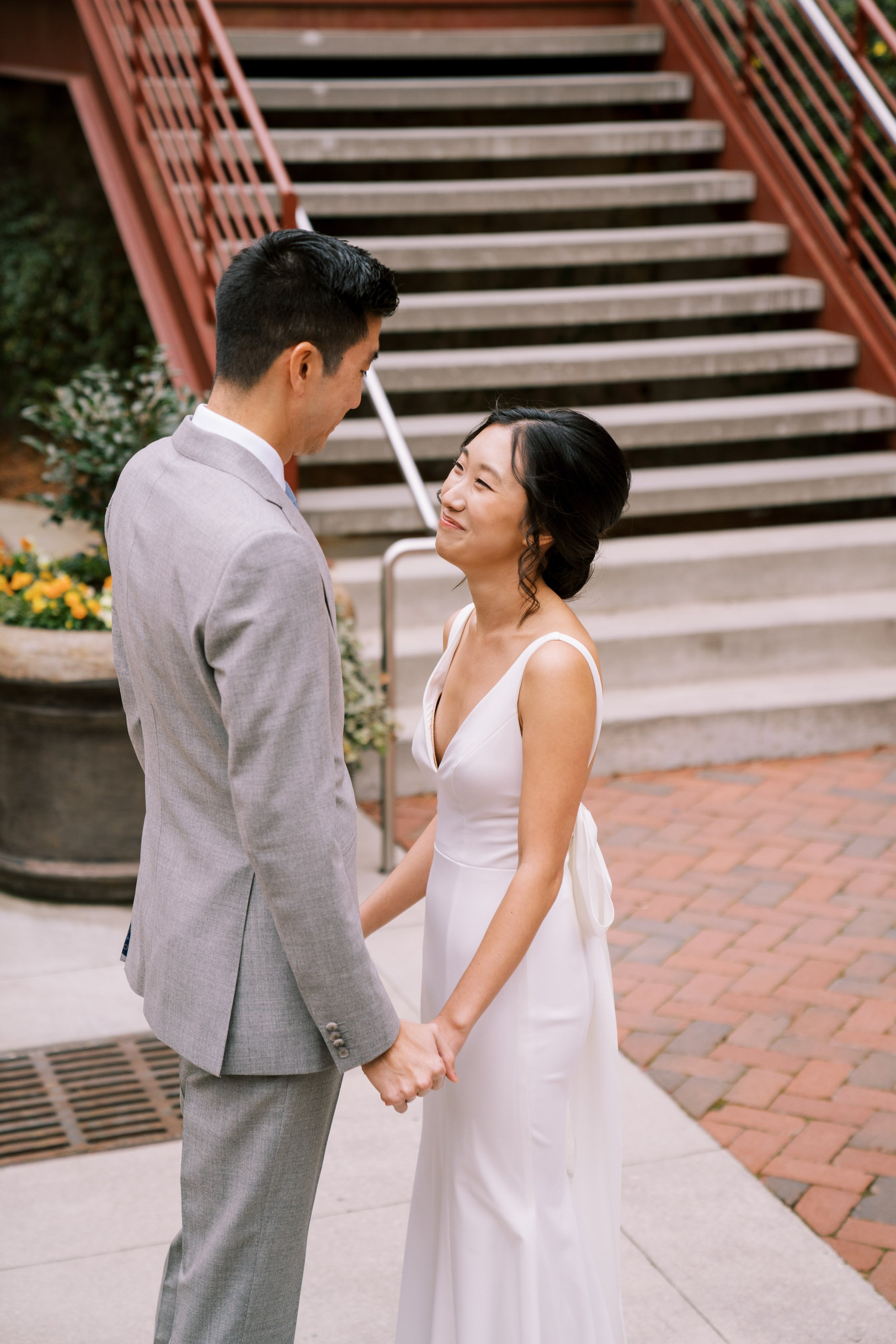 First Look Romance Bride and Groom American Tobacco Campus Wedding at Bay 7 Durham NC Fancy This Photography