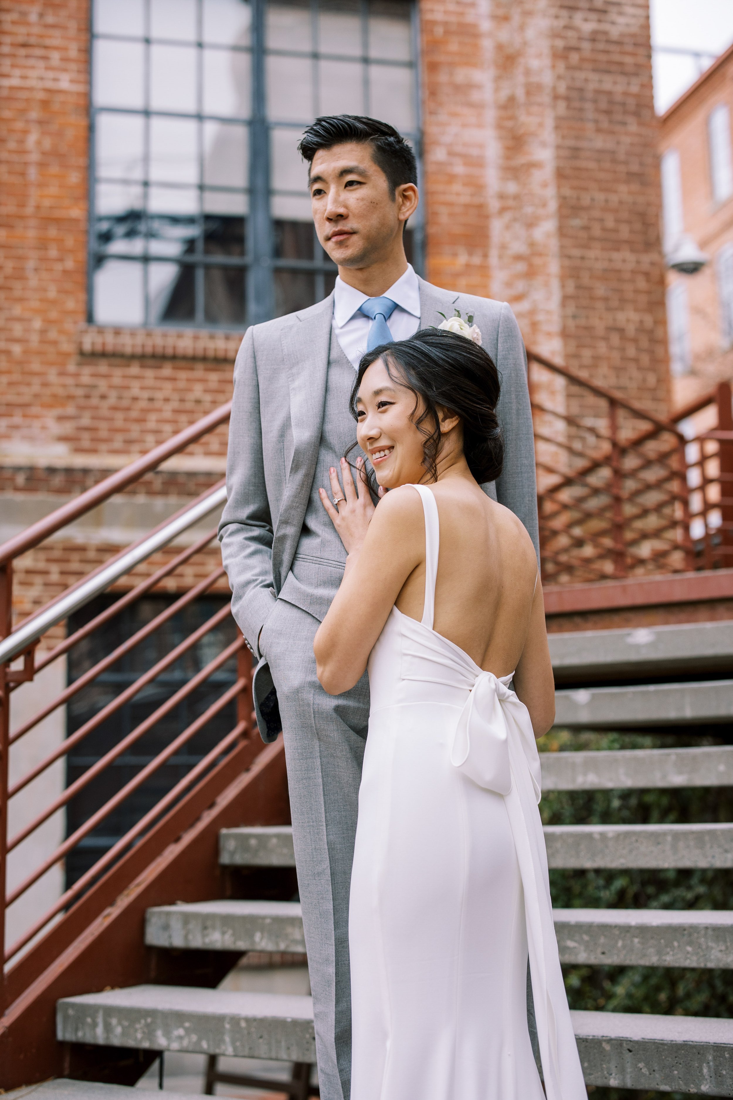 Bride and Groom Staircase American Tobacco Campus Korean Wedding at Bay 7 Durham NC Fancy This Photography