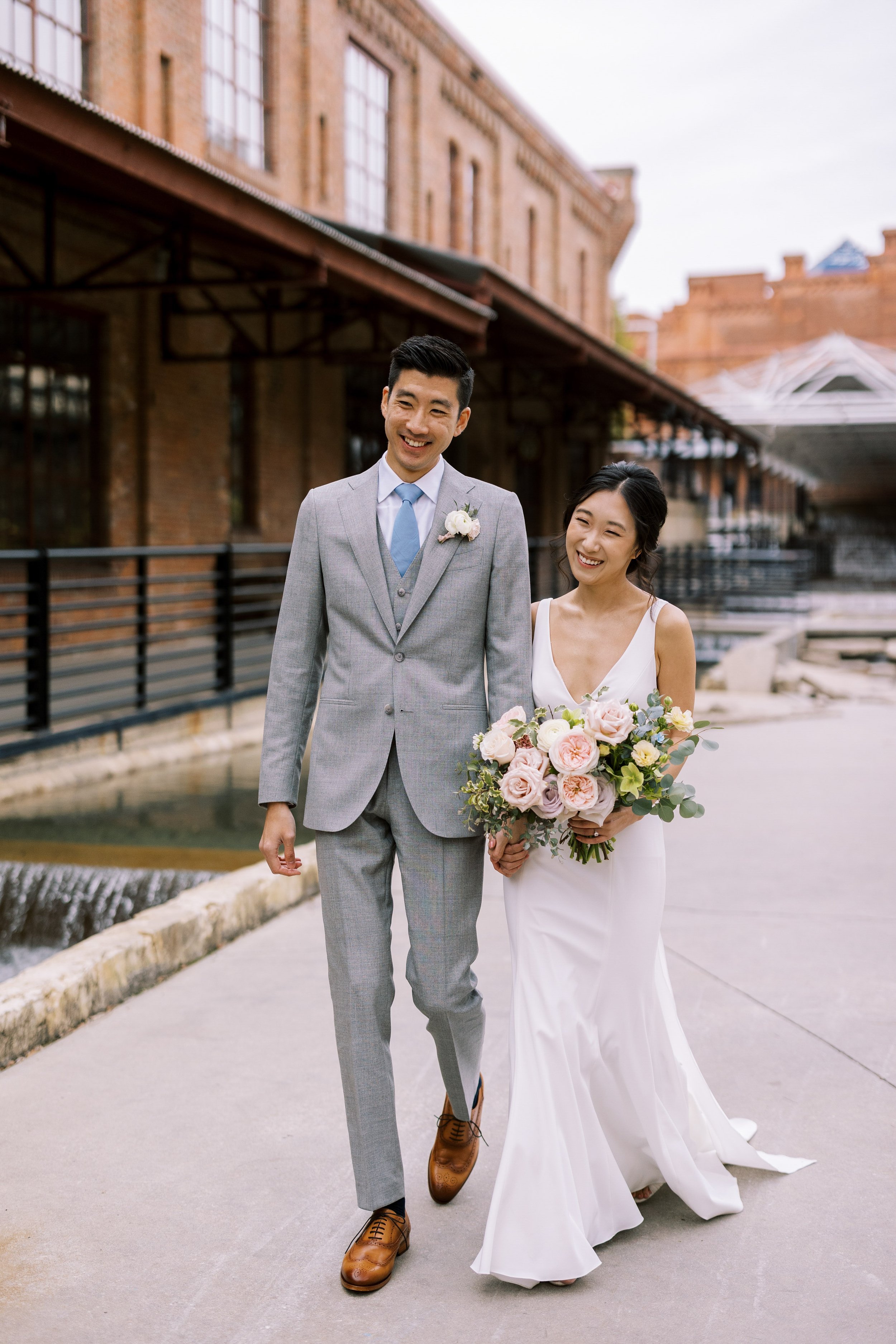 Durham NC Bride and Groom at American Tobacco Campus Wedding at Bay 7 Durham NC Fancy This Photography
