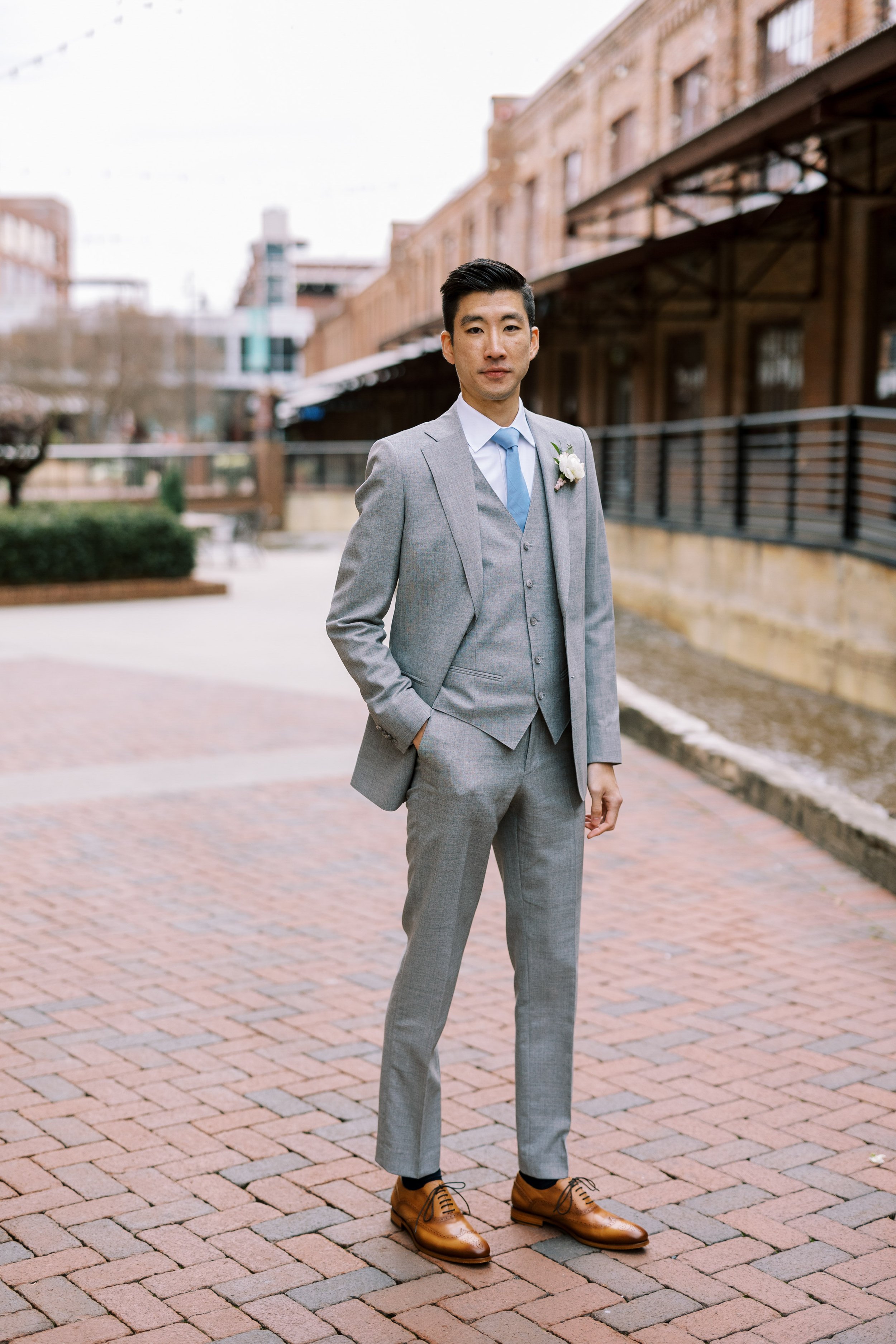 Handsome Groom in Gray American Tobacco Campus Wedding at Bay 7 Durham NC Fancy This Photography