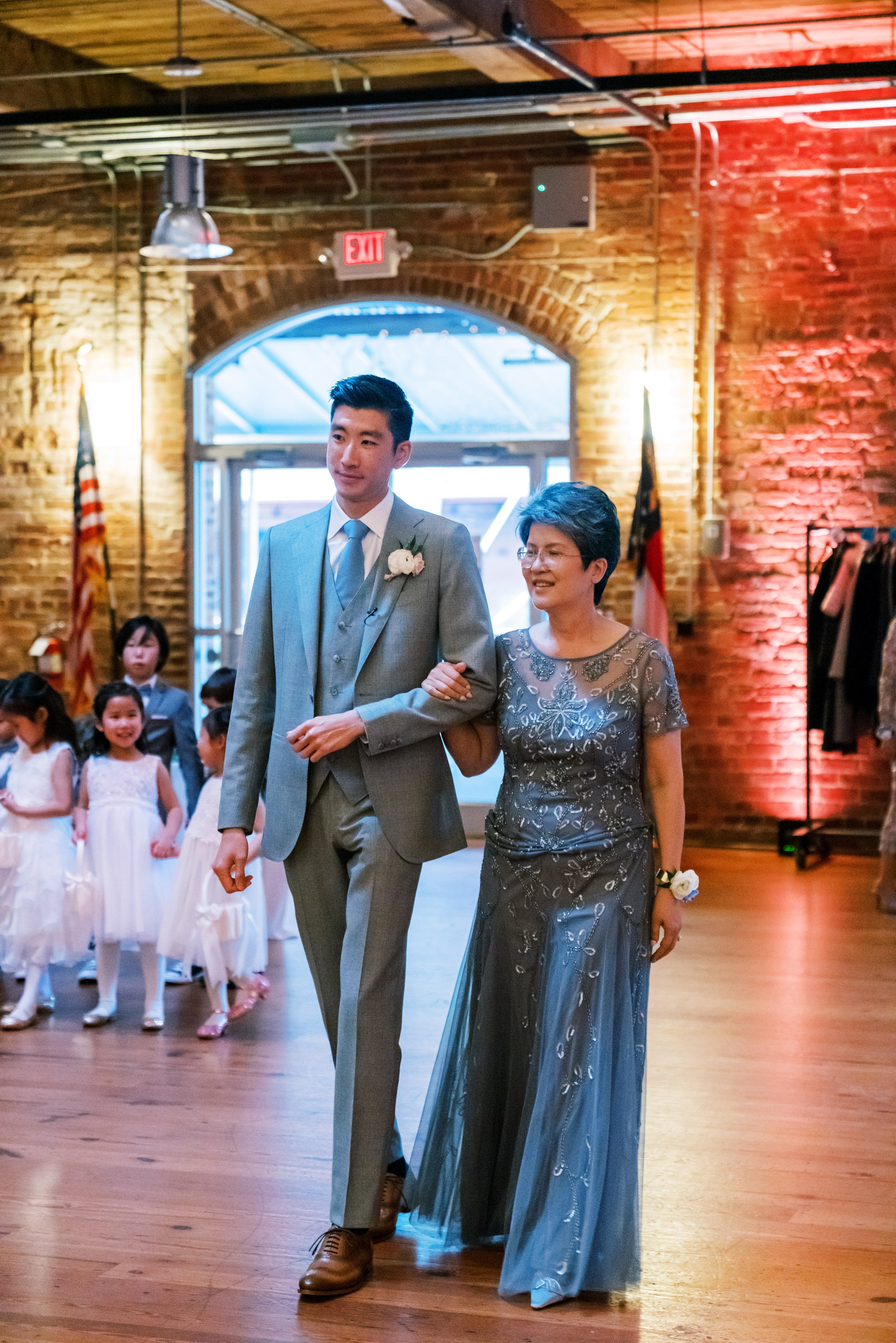 Groom Escorts Mother Down Aisle Wedding at Bay 7 Durham NC Fancy This Photography