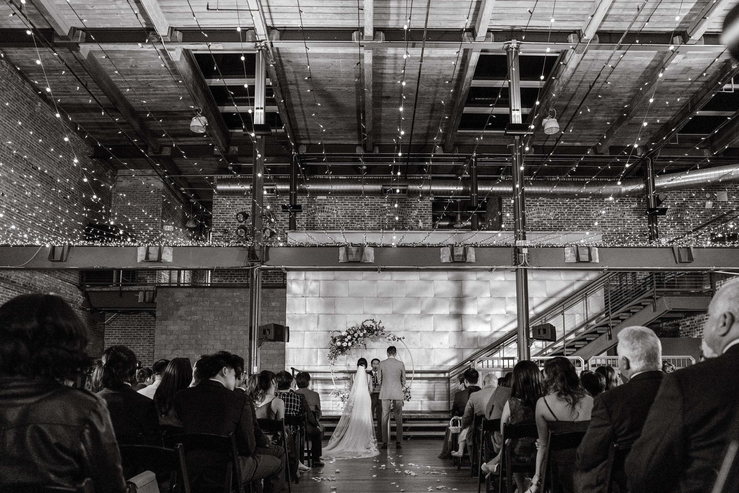 Blacka and White Ceremony Lights Wedding at Bay 7 Durham NC Fancy This Photography