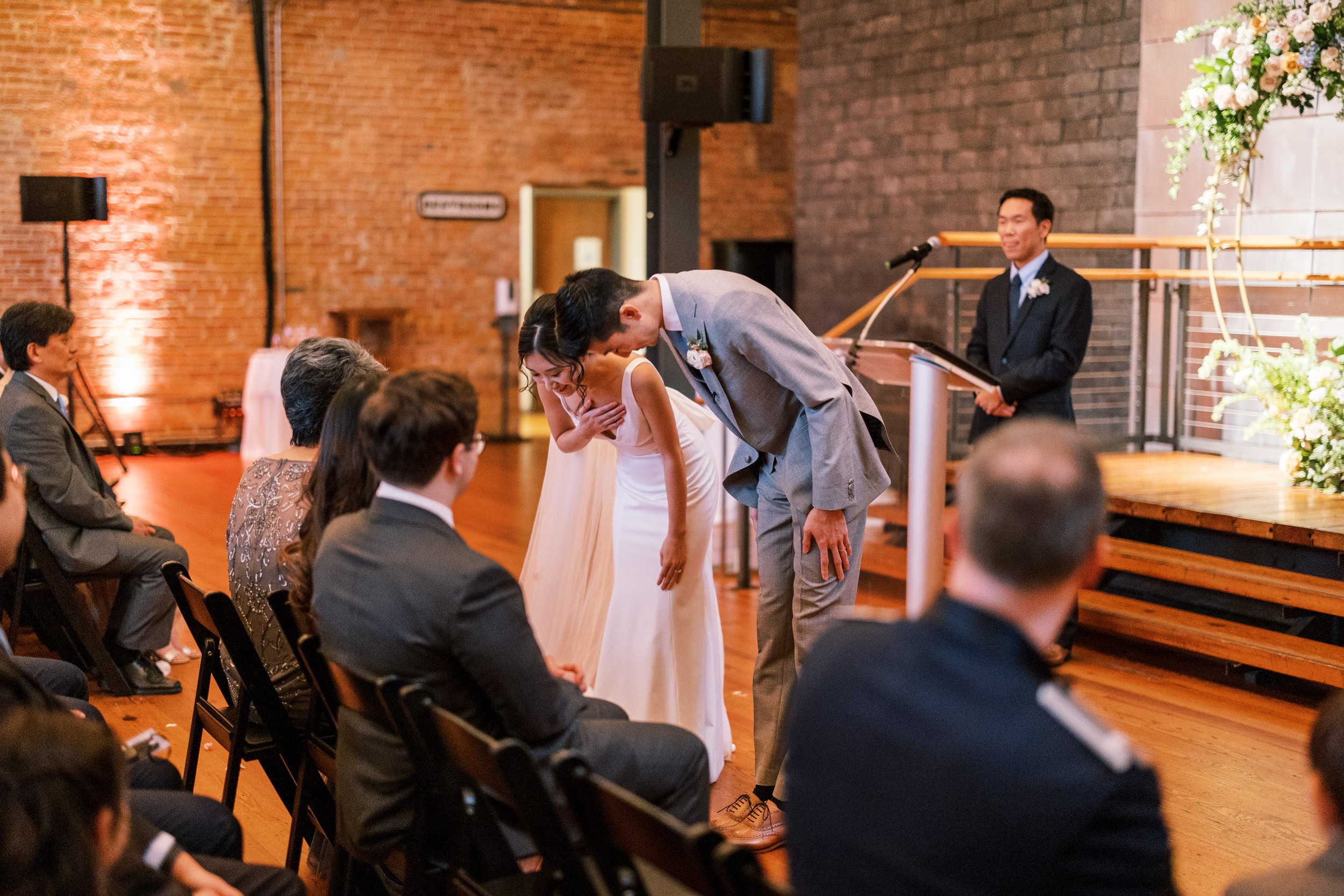 Bride and Groom Bow Ceremony Wedding at Bay 7 Durham NC Fancy This Photography