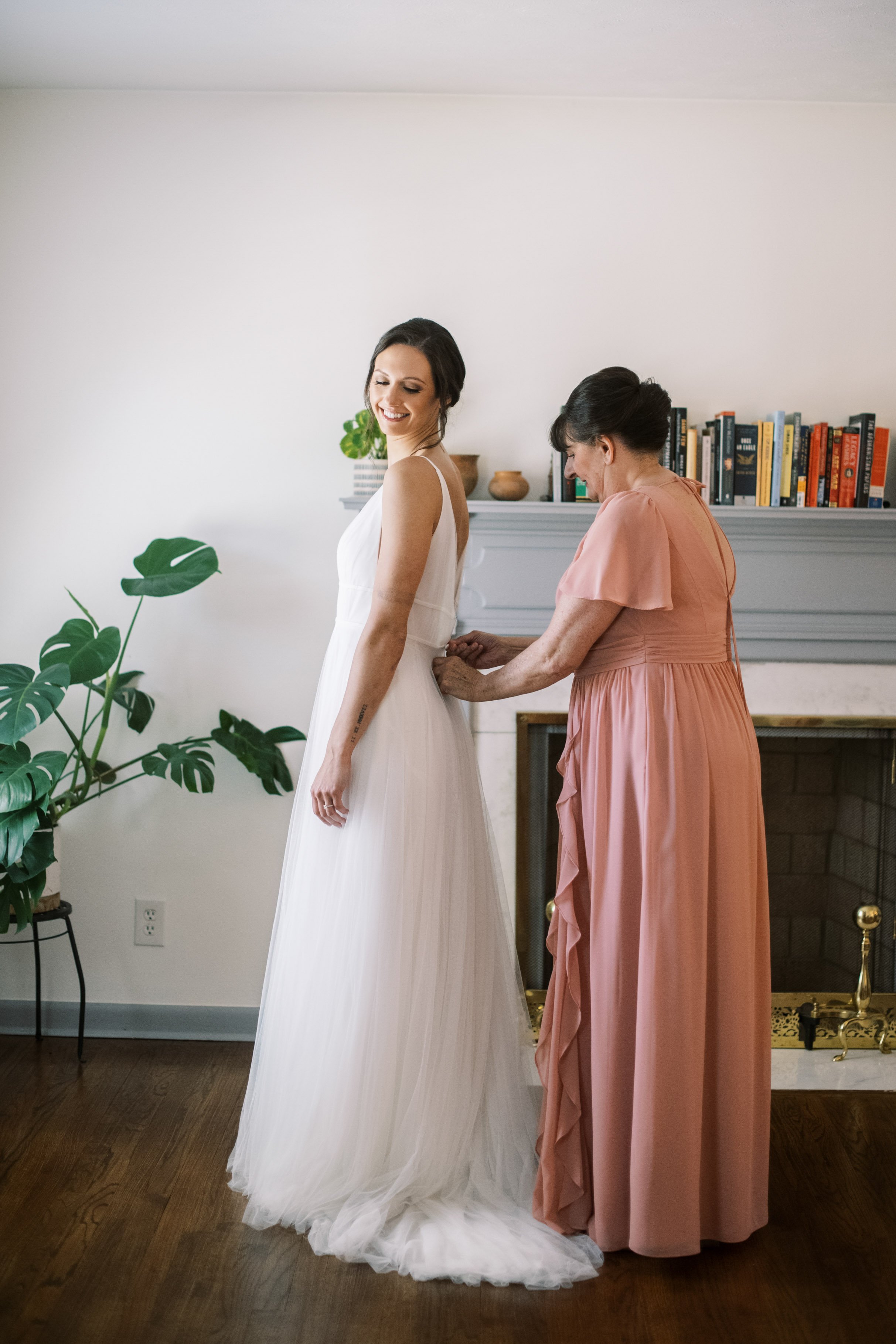 Mother Helps Bride Get Dressed Cape Fear Botanical Garden Wedding Fancy This Photography