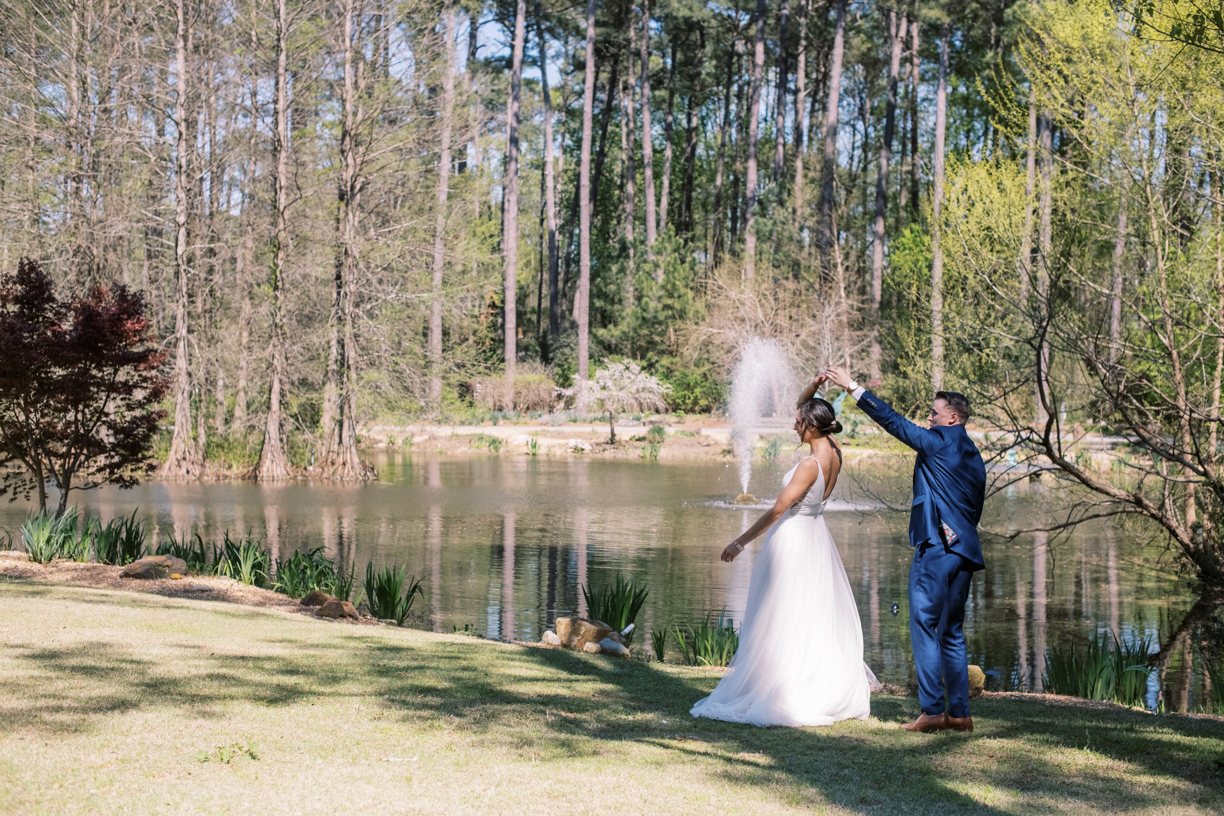 Bride and Groom Dance Pond Cape Fear Botanical Garden Wedding Fancy This Photography