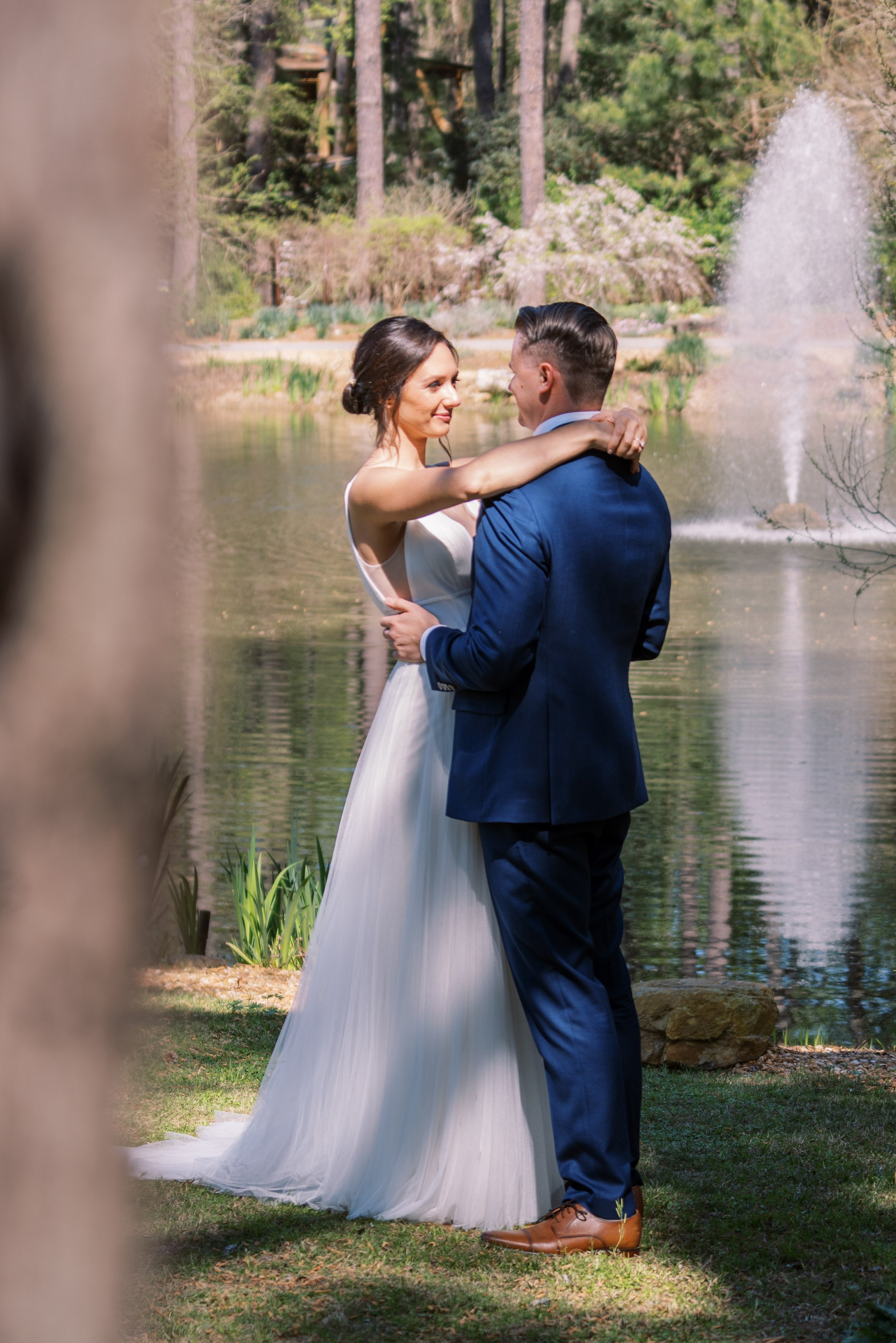Pond Fountain First Look Embrace Cape Fear Botanical Garden Wedding Fancy This Photography