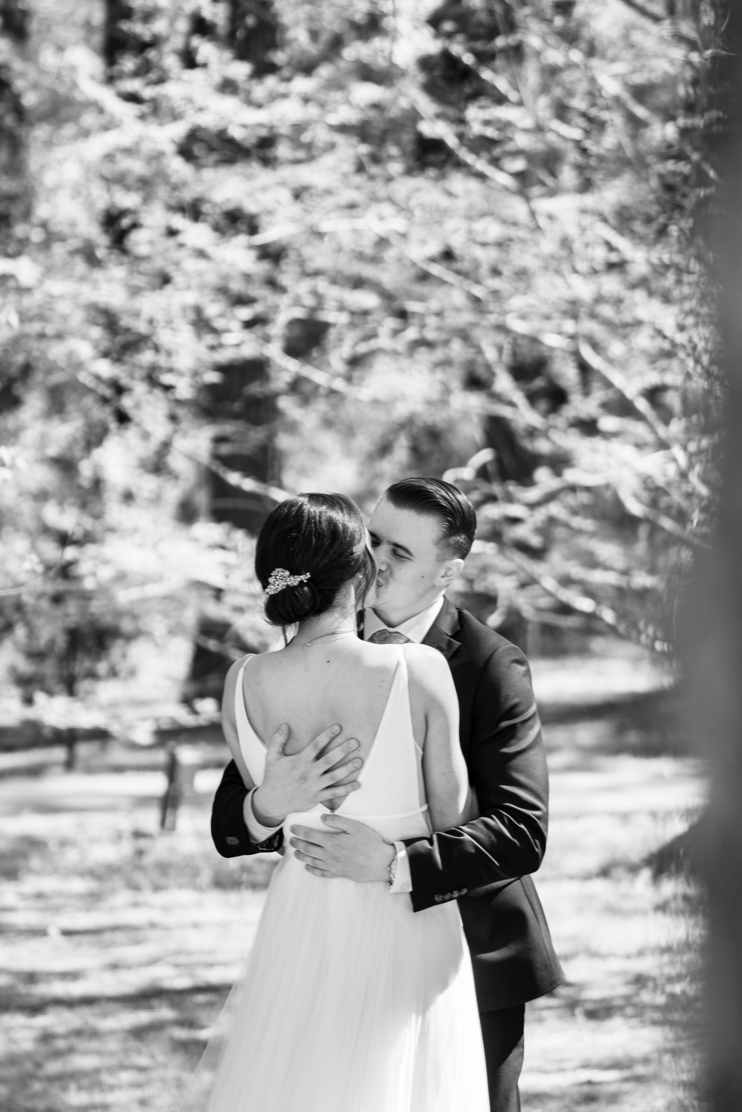 Black and white image First look kiss Cape Fear Botanical Garden Wedding Fancy This Photography
