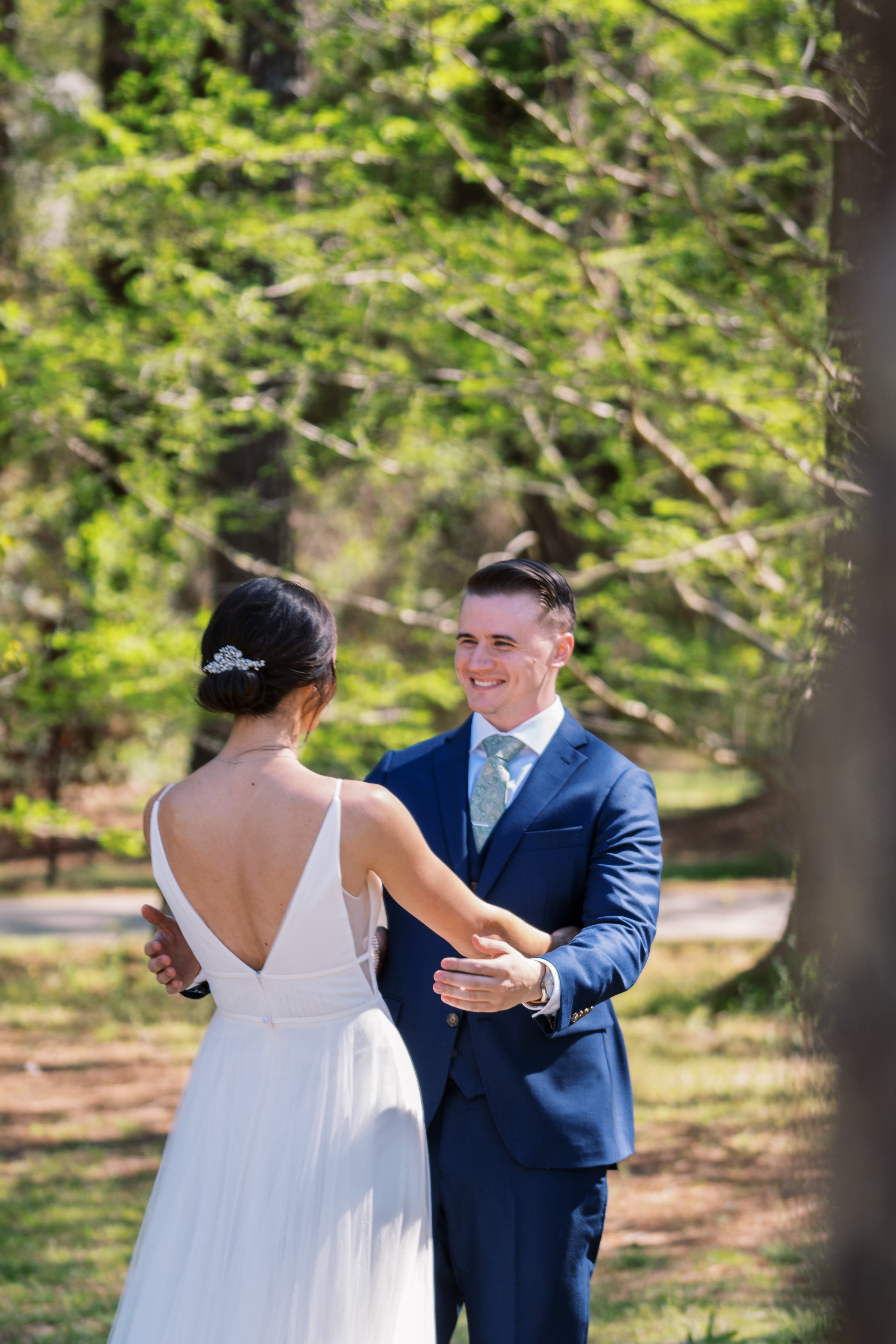 Greenery First Look Bride and Groom Cape Fear Botanical Garden Wedding Fancy This Photography