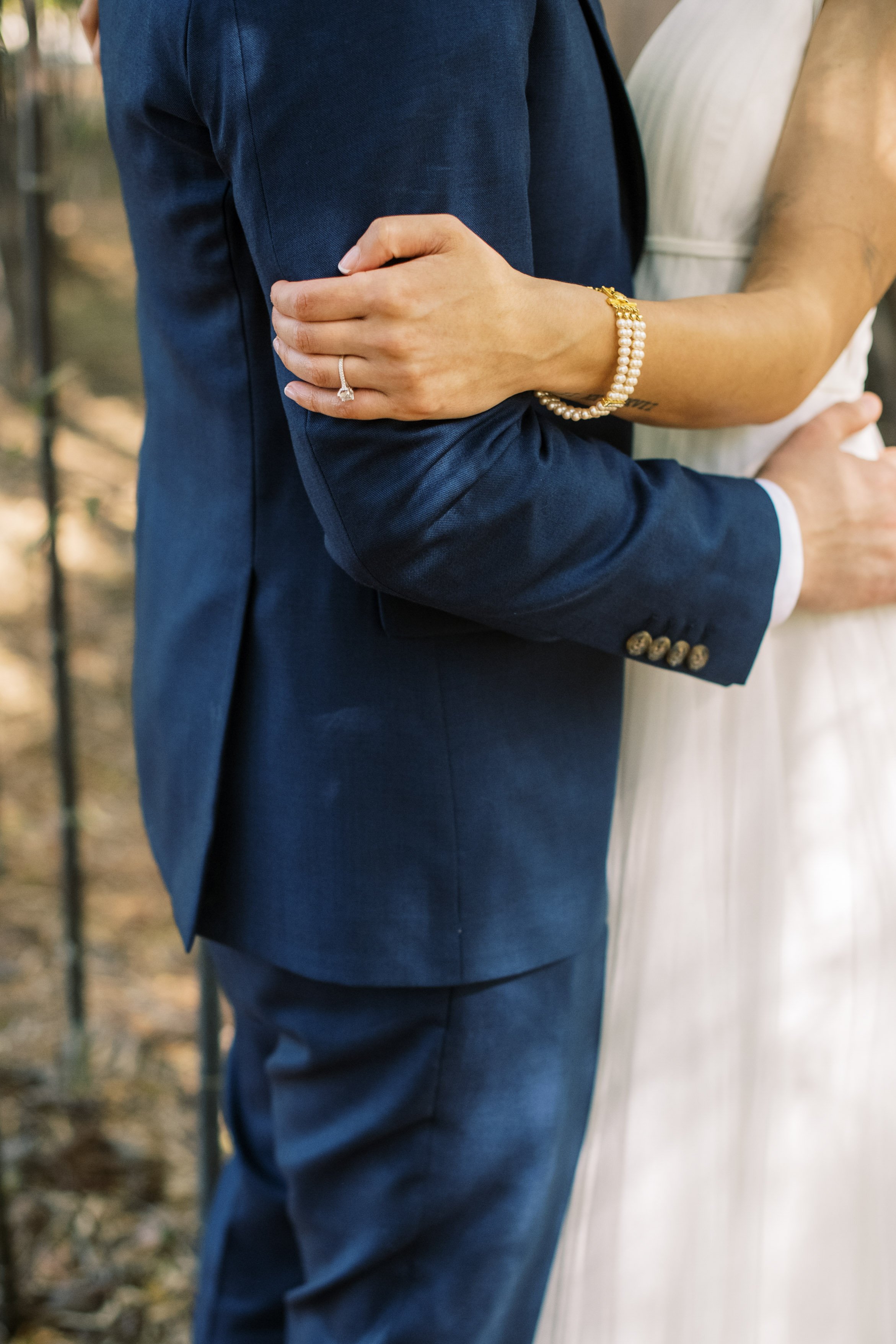 Bride and Groom Hands in Bamboo Forest Cape Fear Botanical Garden Wedding Fancy This Photography