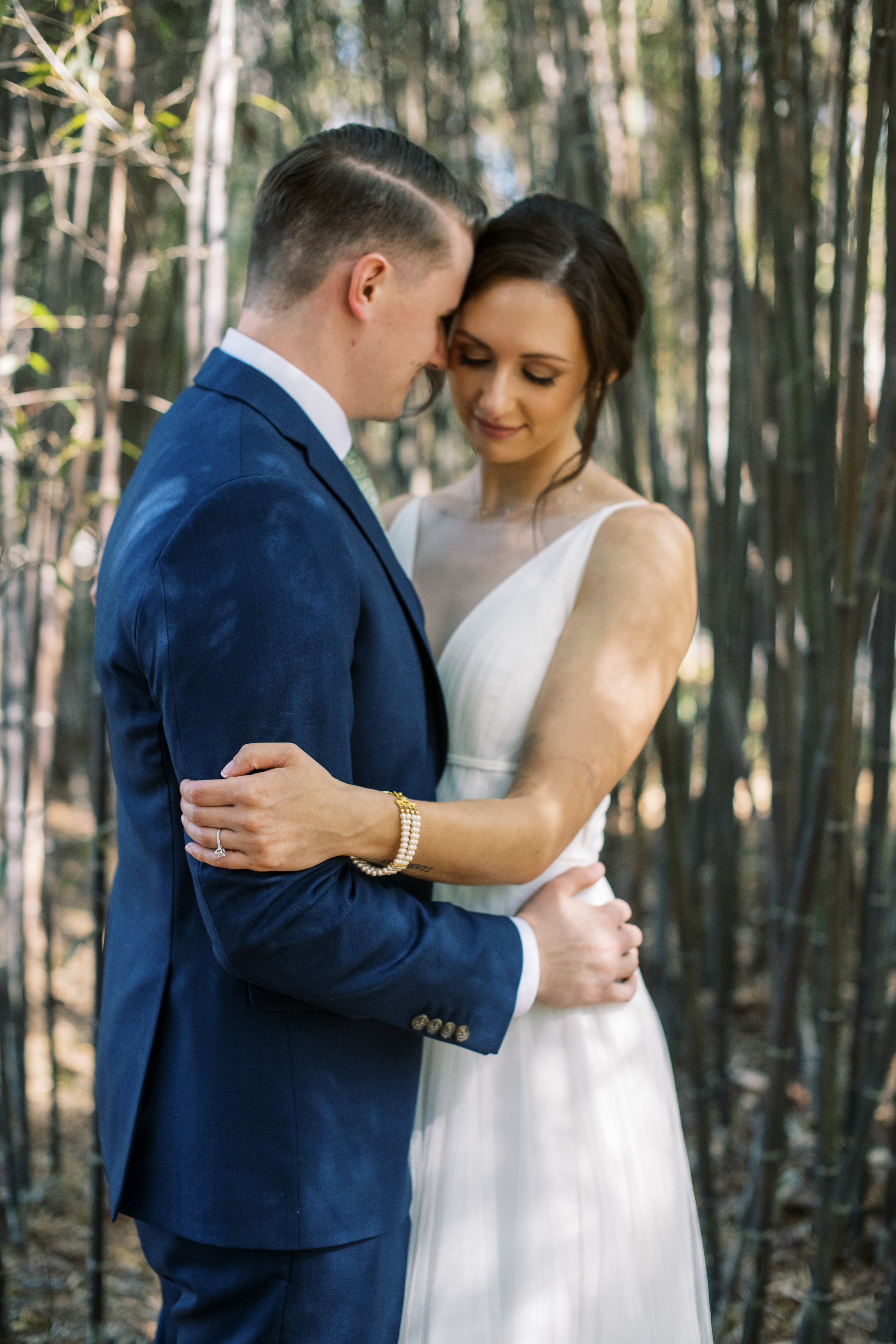 Bride and Groom Romance Bamboo Trees Cape Fear Botanical Garden Wedding Fancy This Photography